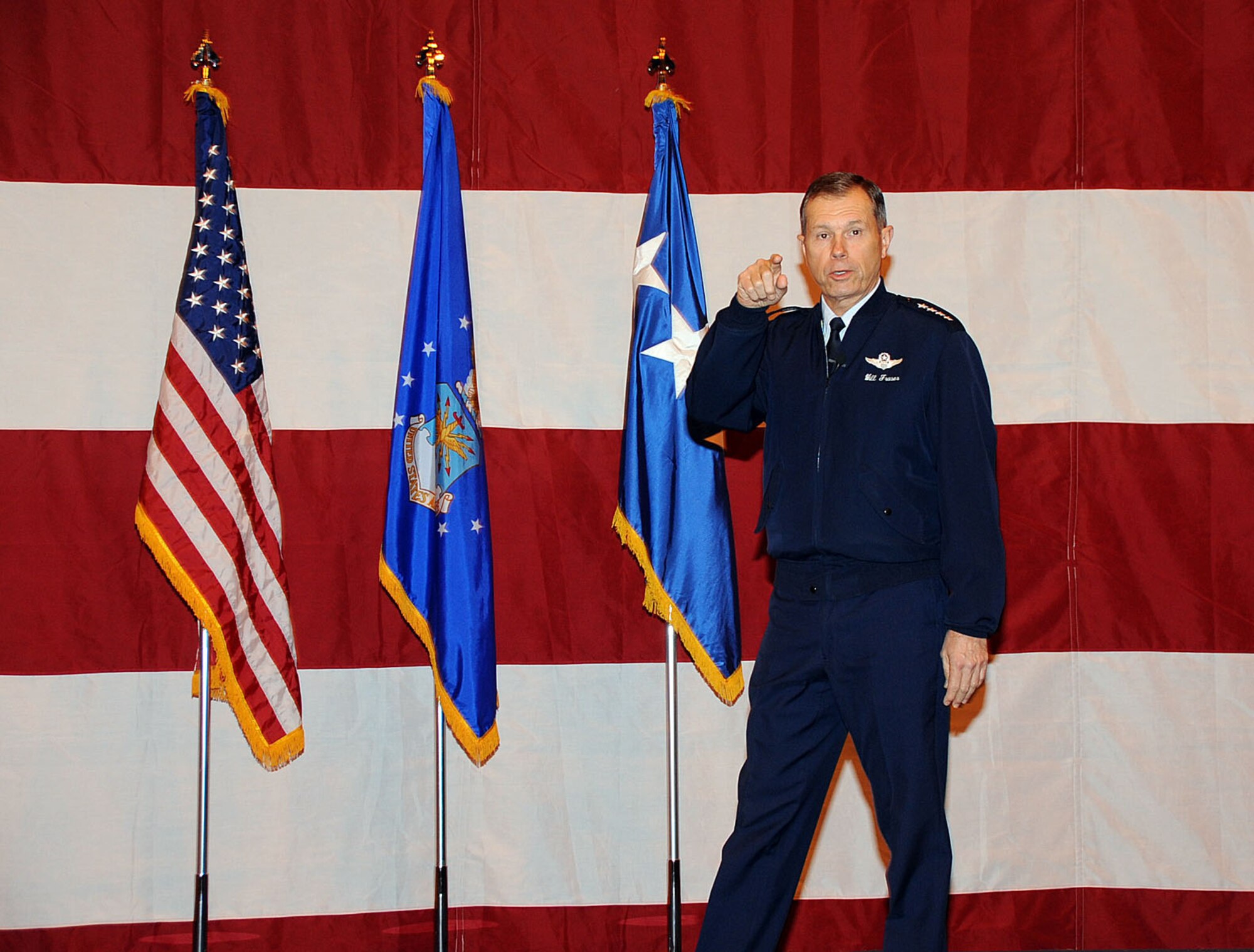 OFFUTT AIR FORCE BASE, Neb. -- Gen. William M. Fraser III, commander of Air Combat Command, speaks to the men and women of Team Offutt during an all call at the Bennie Davis Maintenance Facility here Jan. 11. During the all call, General Fraser shared his vision with Team Offutt and said he was proud of what Team Offutt does. General Fraser visited numerous base facilities including, 55th Wing headquarters, the Ronald L. King Dining Facility and the Patriot Club. He also provided opening remarks at the annual ACC Chief's Orientation at the Dougherty Conference Center. U.S. Air Force Photo by Kendra Williams