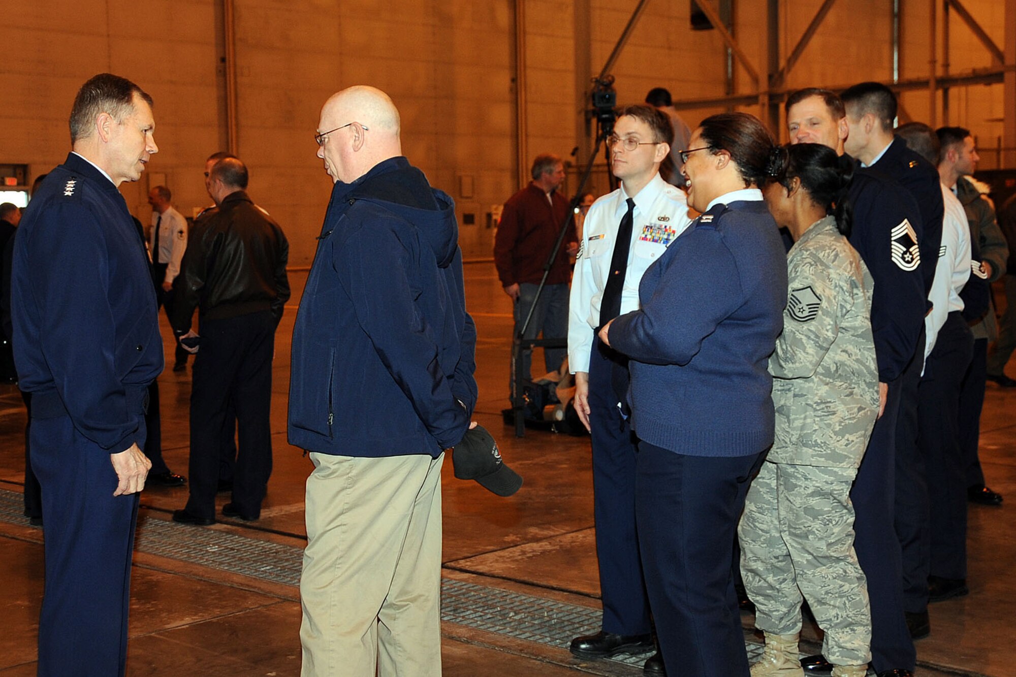 OFFUTT AIR FORCE BASE, Neb. -- Gen. William M. Fraser III, commander of Air Combat Command, answers questions from members of Team Offutt after an all call at the Bennie Davis Maintenance Facility here Jan. 11. The all call was part of General Fraser's visit to Offutt which included tours of numerous facilities including 55th Wing headquarters, the Ronald L. King Dining Facility and the Patriot Club. General Fraser also provided opening remarks at the annual ACC Chief's Orientation at the Dougherty Conference Center. U.S. Air Force Photo by Kendra Williams