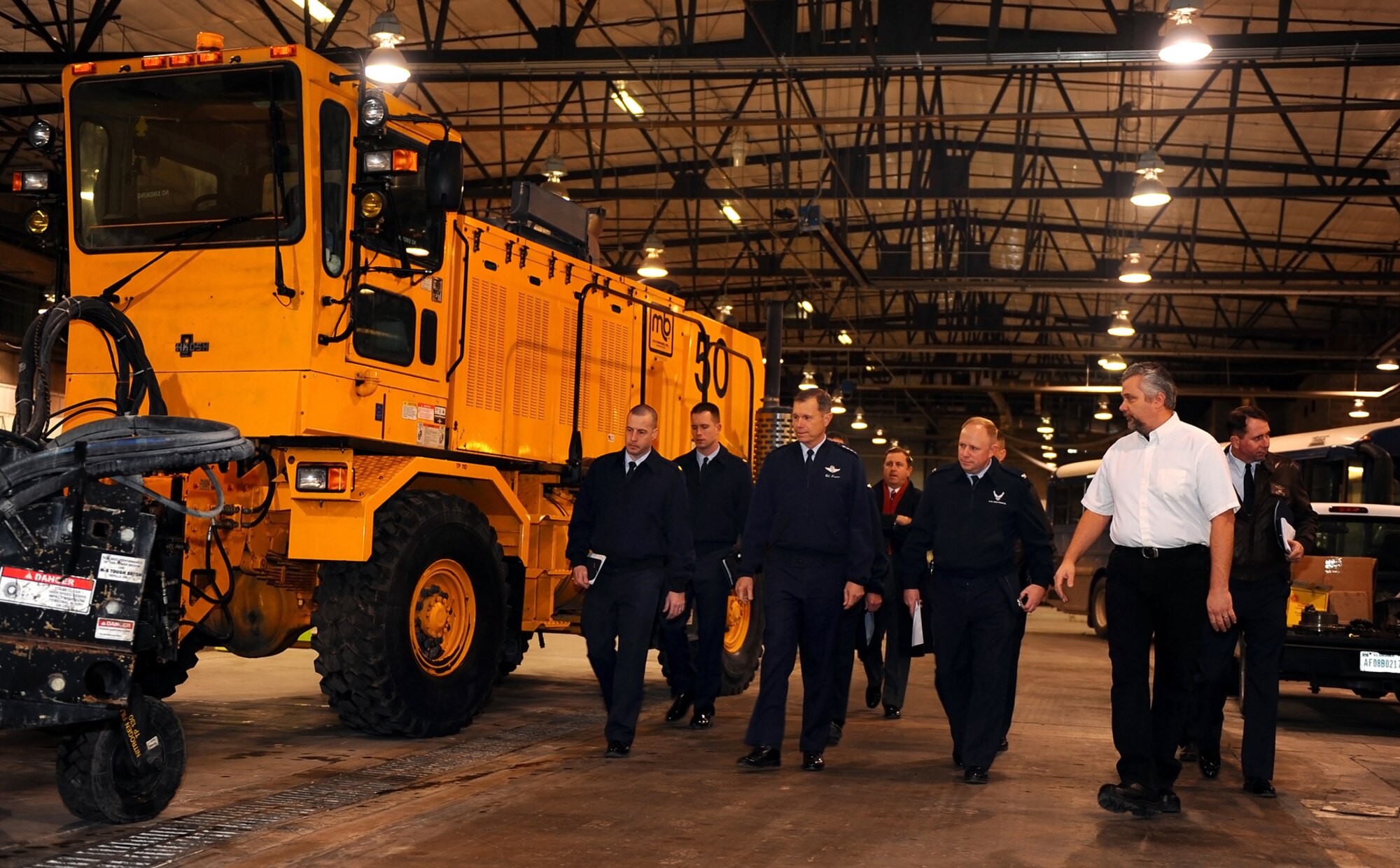 OFFUTT AIR FORCE BASE, Neb. -- Gen. William M. Fraser III, commander of Air Combat Command, along with Brig. Gen. John N.T. Shanahan, 55th Wing commander, Col. Michael J. Allshouse, 55th Mission Support Group commander, tour Offutt's base transportation maintenance section inside the Martin Bomber Building here Jan. 11.  During General Fraser's visit, he provided opening remarks for the annual ACC Chief's Orientation at the Dougherty Conference Center, toured numerous facilities including 55th Wing headquarters and the Patriot Club, and held an all call at Dock 1 of the Bennie Davis Maintenance Facility where he shared his vision with Team Offutt. U.S. Air Force Photo by Josh Plueger

