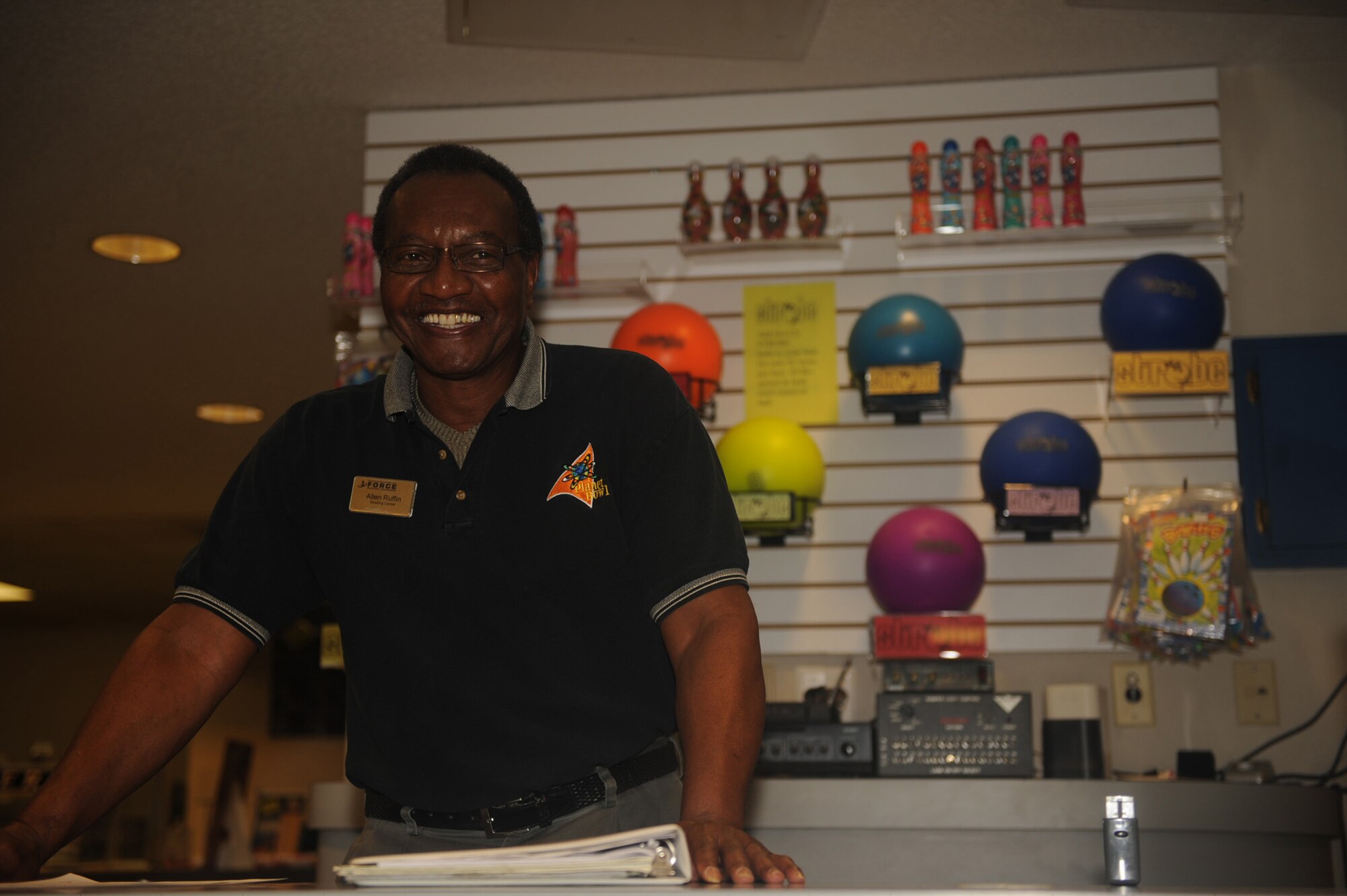 Allen Ruffin, Planet Bowl recreation supervisor, greets each customer the same way he has for the past 40 years on Seymour Johnson Air Force Base, Jan. 7, 2010 -- with a smile.  He began his career as a janitorial worker at the age of 19 and has since become a "jack of all trades" at the bowling center, except in the kitchen.  (U.S. Air Force photo/Senior Airman Ciara Wymbs)