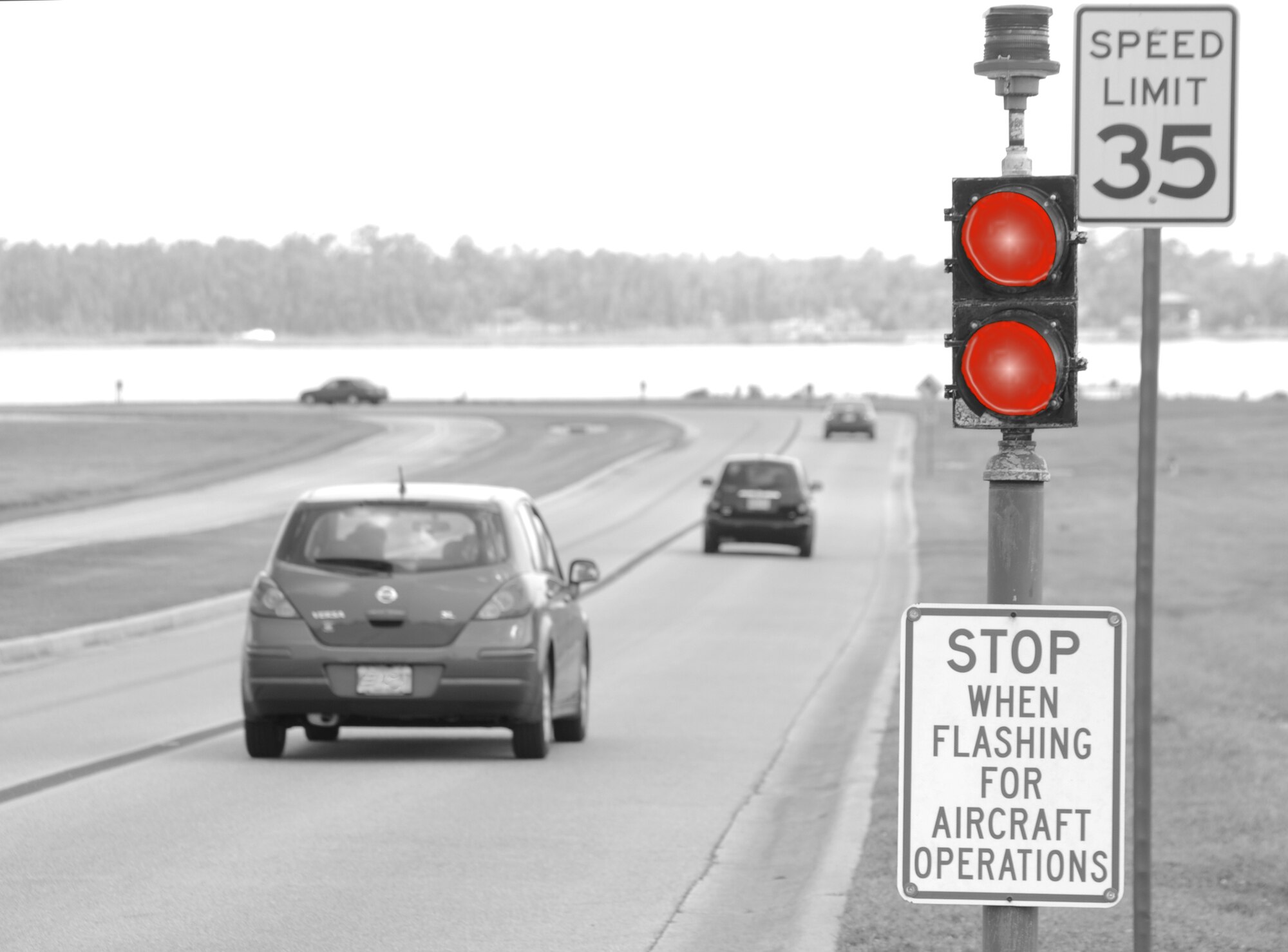 Ignoring runway cautions can get you fired from your job or injured. To stay safe, Keesler drivers and runners must observe caution lights and rules about runway use.  (U.S. Air Force photo by Kemberly Groue)