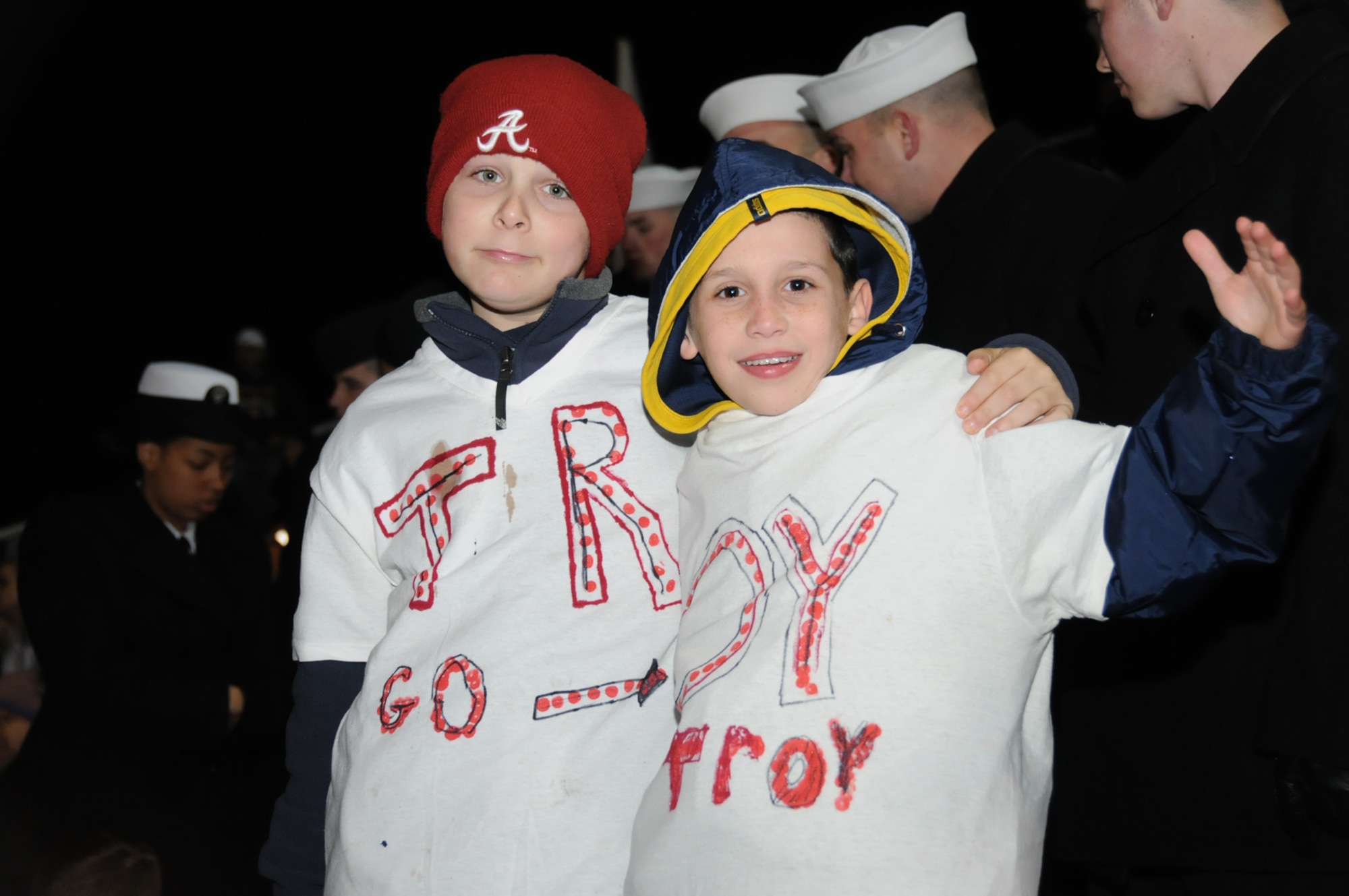 James Edward, 11, son of John and Heather Overmark, 336th TRS, and Joseph Fowler, 10, son of Thomas and Krystal Sandoz, 81st Medical Operations Squadron, support their team at the 2009 GMAC Bowl, Jan. 6 in Mobile, Ala.  Military members were special guests for the event and the Keesler Honor Guard participated in pregame ceremonies.  Central Michigan University won the double overtime contest, 44-41, over Alabama’s Troy University.  (U.S. Air Force photo by Kemberly Groue)