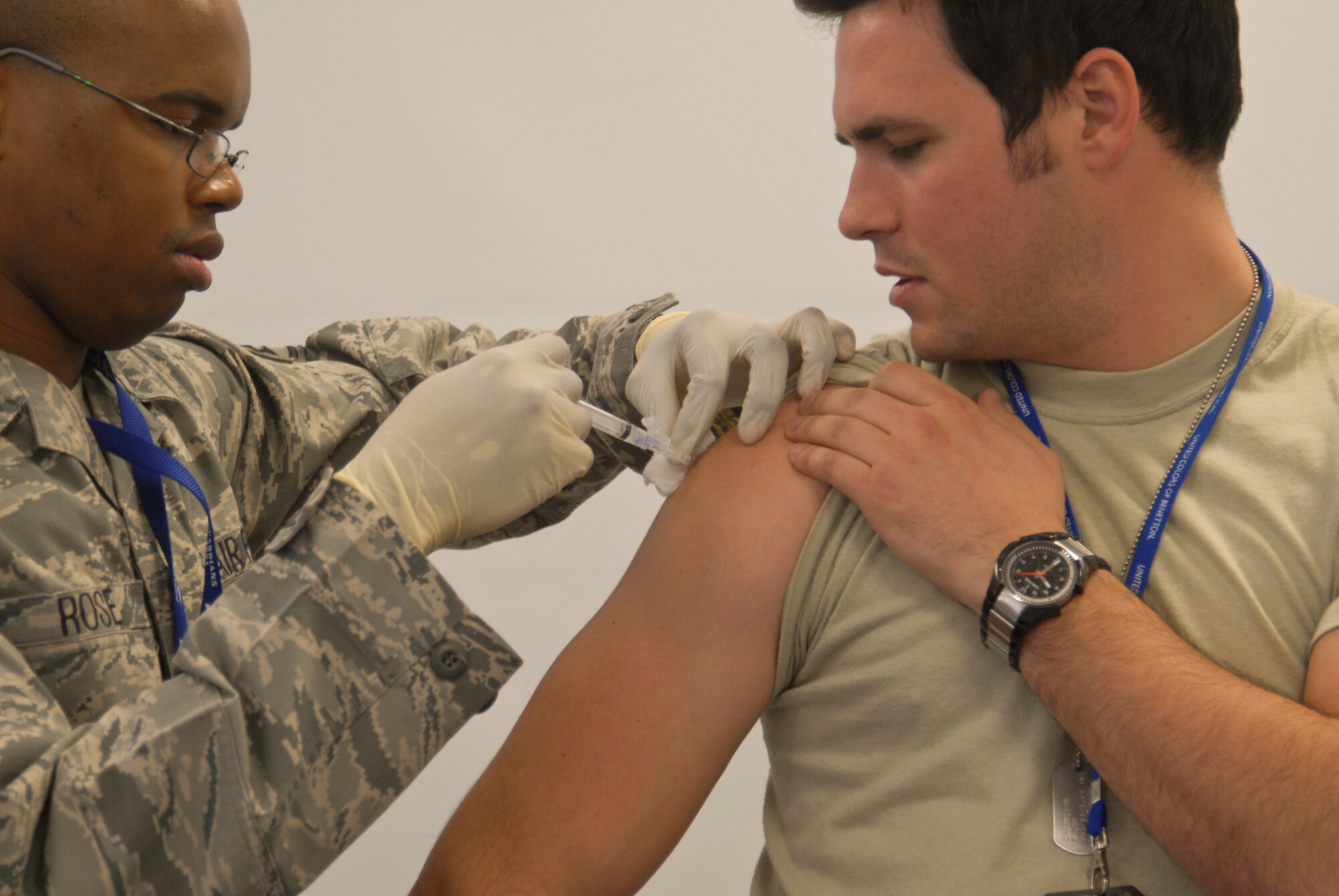 SSgt Christopher Rose, 113th Wing Medical Group, injects SSgt Jesse McCarley, 121st Fighter Squadron Aircrew Flight Equipment, with the H1N1 vaccine, January 9. The H1N1 vaccine is critical in keeping Air National Guard members healthy at home and in forward deployed locations. (DCANG photo by Tech. Sgt. William R. Parks)