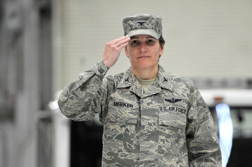 Col. Martha Meeker returns a salute after receiving her first salute from the members of the 628th Air Base Wing during the 628 ABW activation ceremony here Jan. 8. The ceremony served as a key moment in Charleston AFB's ongoing transition to a future structure as Joint Base Charleston. Colonel Meeker is the 628 ABW commander. (U.S. Air Force photo/Staff Sgt. Marie Brown)
