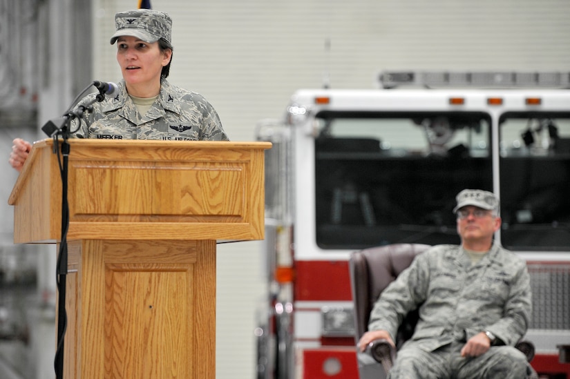 Col. Martha Meeker delivers her remarks after assuming command of the 628th Air Base Wing during an activation ceremony here Jan. 8. In her speech, Colonel Meeker highlighted the role of the 628 ABW in facilitating joint operations between Charleston AFB and Naval Weapons Station Charleston as both move toward becoming Joint Base Charleston. Colonel Meeker is the 628 ABW commander. (U.S. Air Force photo/Staff Sgt. Marie Brown)