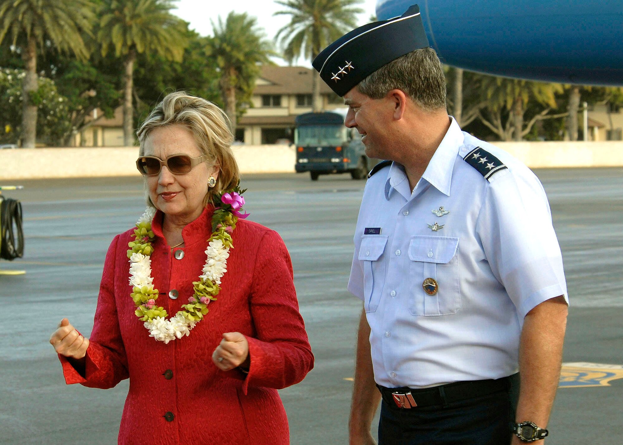 HICKAM AIR FORCE BASE, Hawaii - Lieutenant General Daniel J. Darnell, Deputy Commander, U.S. Pacific Command and 15th Airlift Wing vice commander, Colonel Sam C. Barrett welcomes, Secretary of State Hillary Rodham Clinton upon her arrival here, at Hickam Air Force Base Hawaii, on Jan. 11.  Clinton is kicking off her 2010 diplomacy agenda, to strengthen U.S. relations with key partner nations in the western Pacific, with a 10-day trip scheduled to take her to Australia, New Zealand and Papua New Guinea, with a stop in Hawaii to give a policy speech and a one-on-one meeting with her Japanese counterpart.  (U.S. Air Force photo/Tech Sgt. Jerome S. Tayborn)