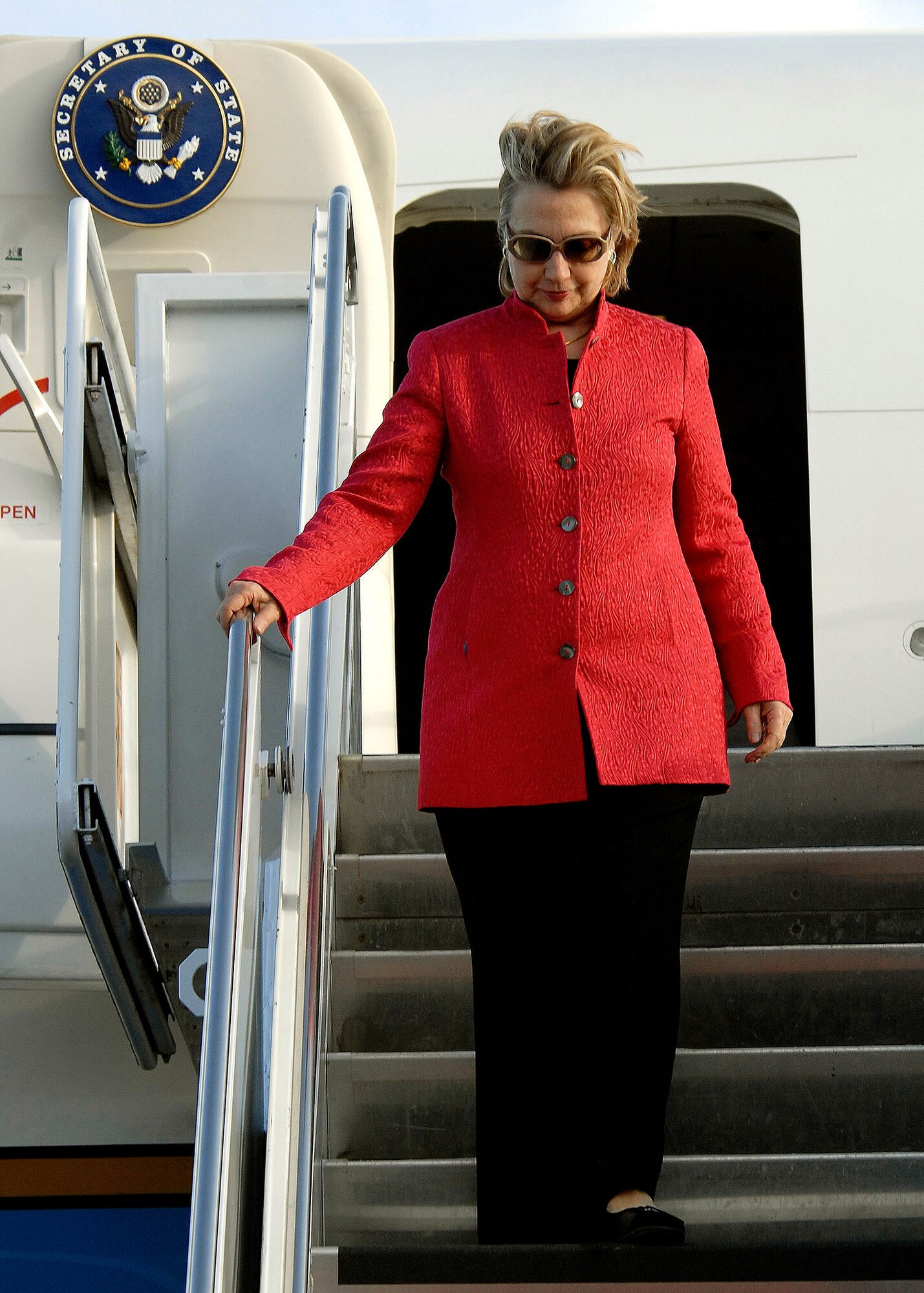 HICKAM AIR FORCE BASE, Hawaii - Secretary of State Hillary Rodham Clinton, as she arrivals, at Hickam Air Force Base Hawaii, on Jan. 11.  Clinton is kicking off her 2010 diplomacy agenda, to strengthen U.S. relations with key partner nations in the western Pacific, with a 10-day trip scheduled to take her to Australia, New Zealand and Papua New Guinea, with a stop in Hawaii to give a policy speech and a one-on-one meeting with her Japanese counterpart.  (U.S. Air Force photo/Tech Sgt. Jerome S. Tayborn)