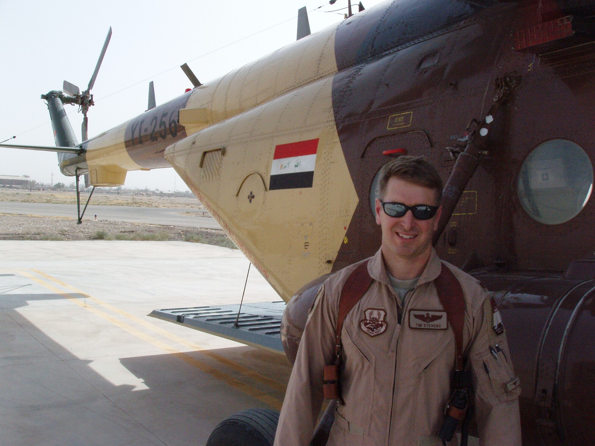 Major Tim Stevens in front of an Iraqi air force Mi-17 HIP helicopter after a flight on Sept. 13, 2009.  HIPs, KA-350 King Airs and C-130 aircraft are the backbone of the IAF transport aircraft. (U.S. Air Force ohoto/Maj. Brian Grill).