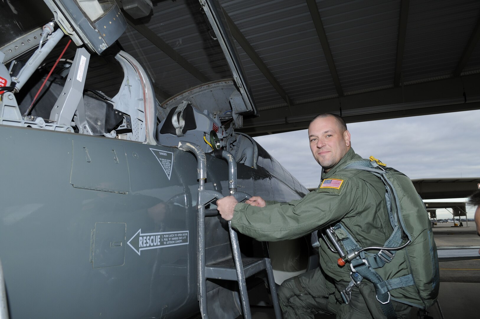 C.B. Hudson, lead guitarist for Blue October, climbs into the cockpit of a T-38 at Randolph Air Force Base, Texas, before his orientation flight Jan. 12. Blue October played the July 4th concert at Ramstein Air Base, Germany, in conjunction with the United Service Organizations.  (U.S. Air Force photo/Steve White)