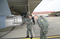 Maj. Kyle Goldstein, a T-38 pilot with the 435th Fighter Training Squadron, conducts a pre-flight inspection with C.B. Hudson, lead guitarist for Blue October, before an orientation flight Jan. 12. Blue October played the July 4th concert at Ramstein Air Base, Germany, in conjunction with the United Service Organizations.  (U.S. Air Force photo/Steve White)