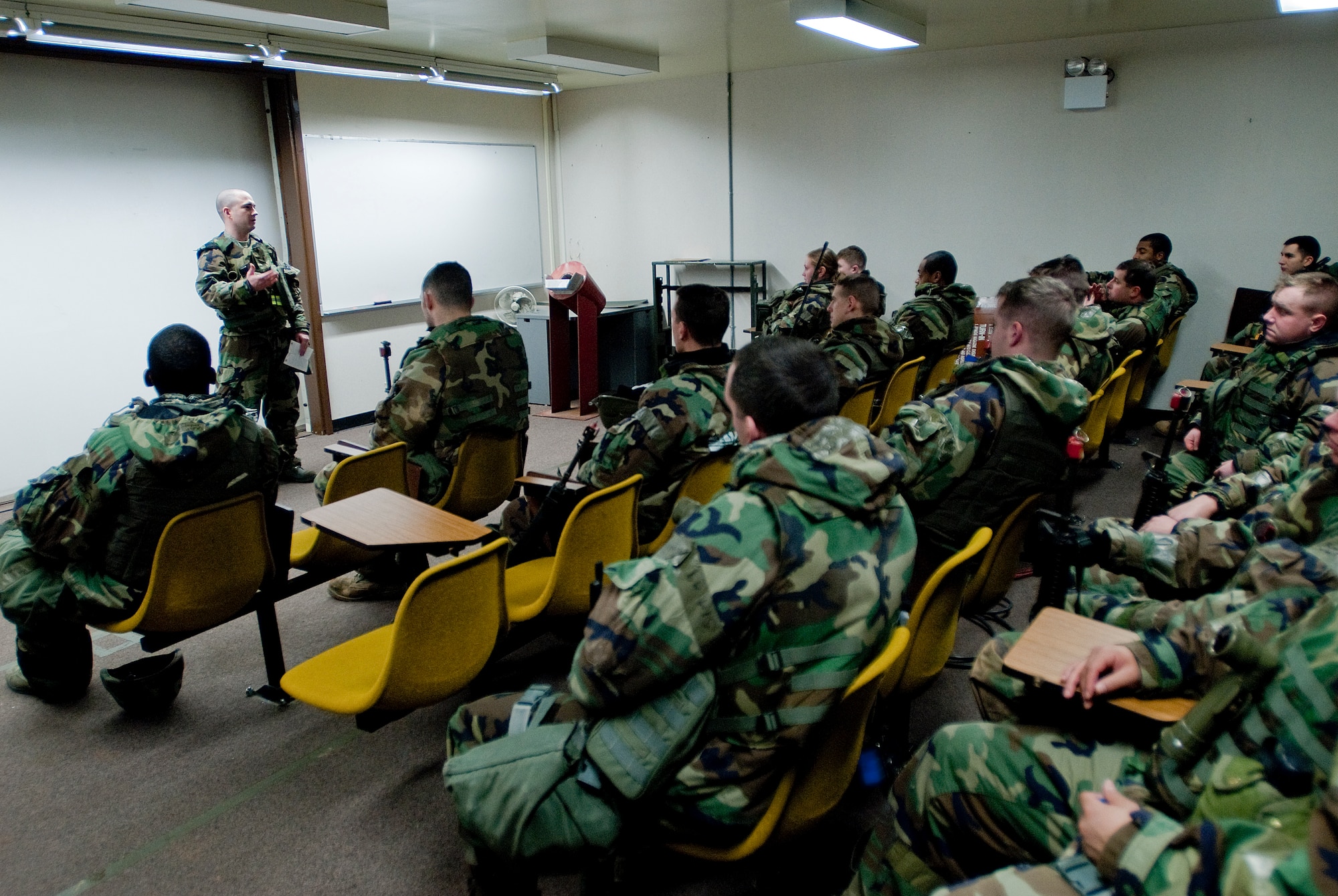 Capt. Jay Bragga, 8th Fighter Wing legal office, gives a brief to 8th Security Forces Squadron members and augmentees about the rules of engagement during Armistice and wartime Jan. 12.  He explained the differences in the rules of engagement and how it affects them. (U.S. Air Force photo\Senior Airman Jonathan Steffen)
