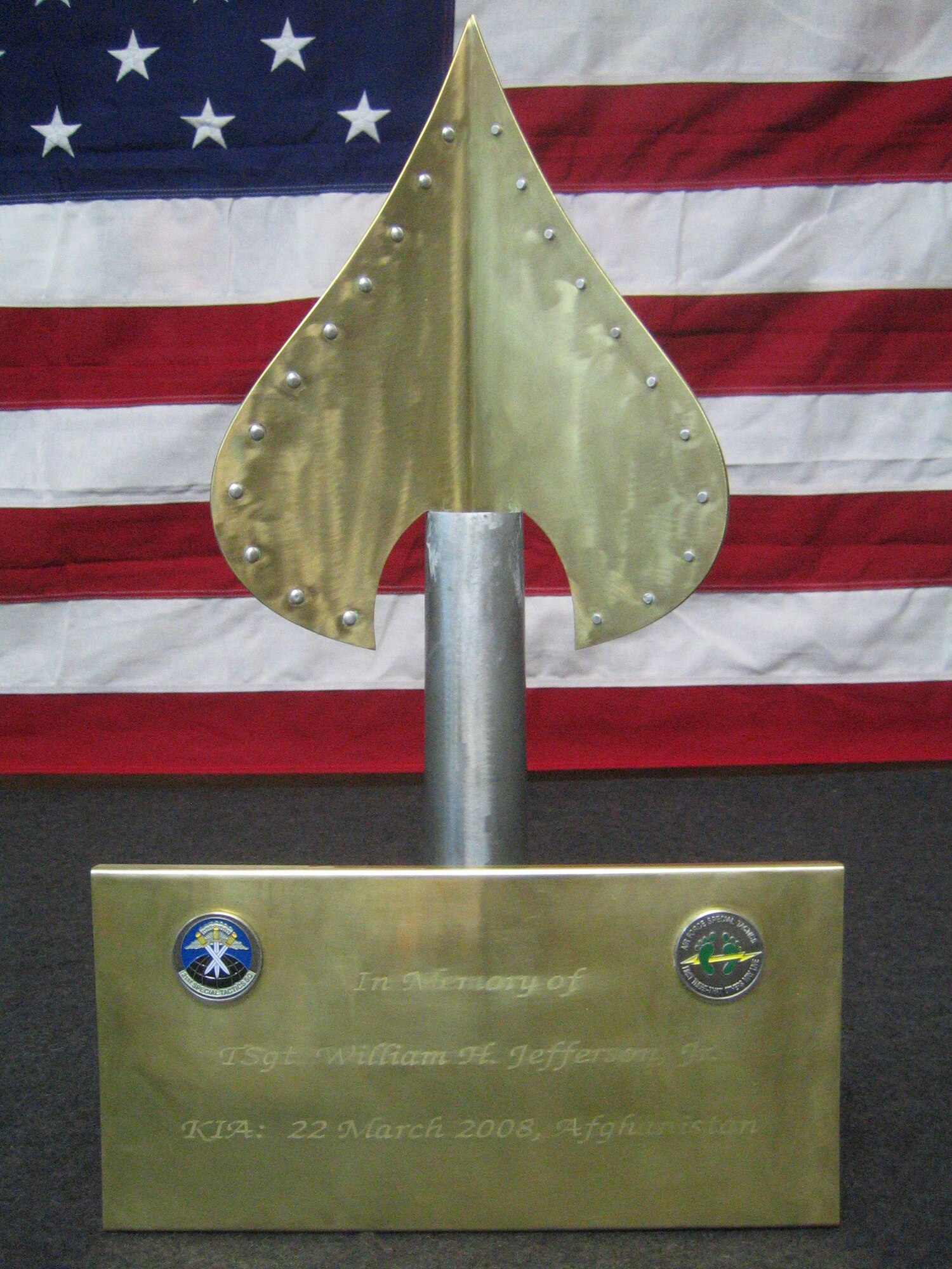 Staff Sgt. William Miller and Staff Sgt. Derek Spencer, aircraft maintenance technicians from Hurlburt Field deployed to the 1st Expeditionary Special Operations Maintenance Squadron, used 105mm shell casings to make an inscription and finial for a flagpole dedicated to Tech. Sgt. William Jefferson Jr., a combat controller with the 21st Special Tactics Squadron, who died March 22, 2008. The inscription was hand carried to the flagpole at Camp Jefferson in Afghanistan. (Courtesy photo)