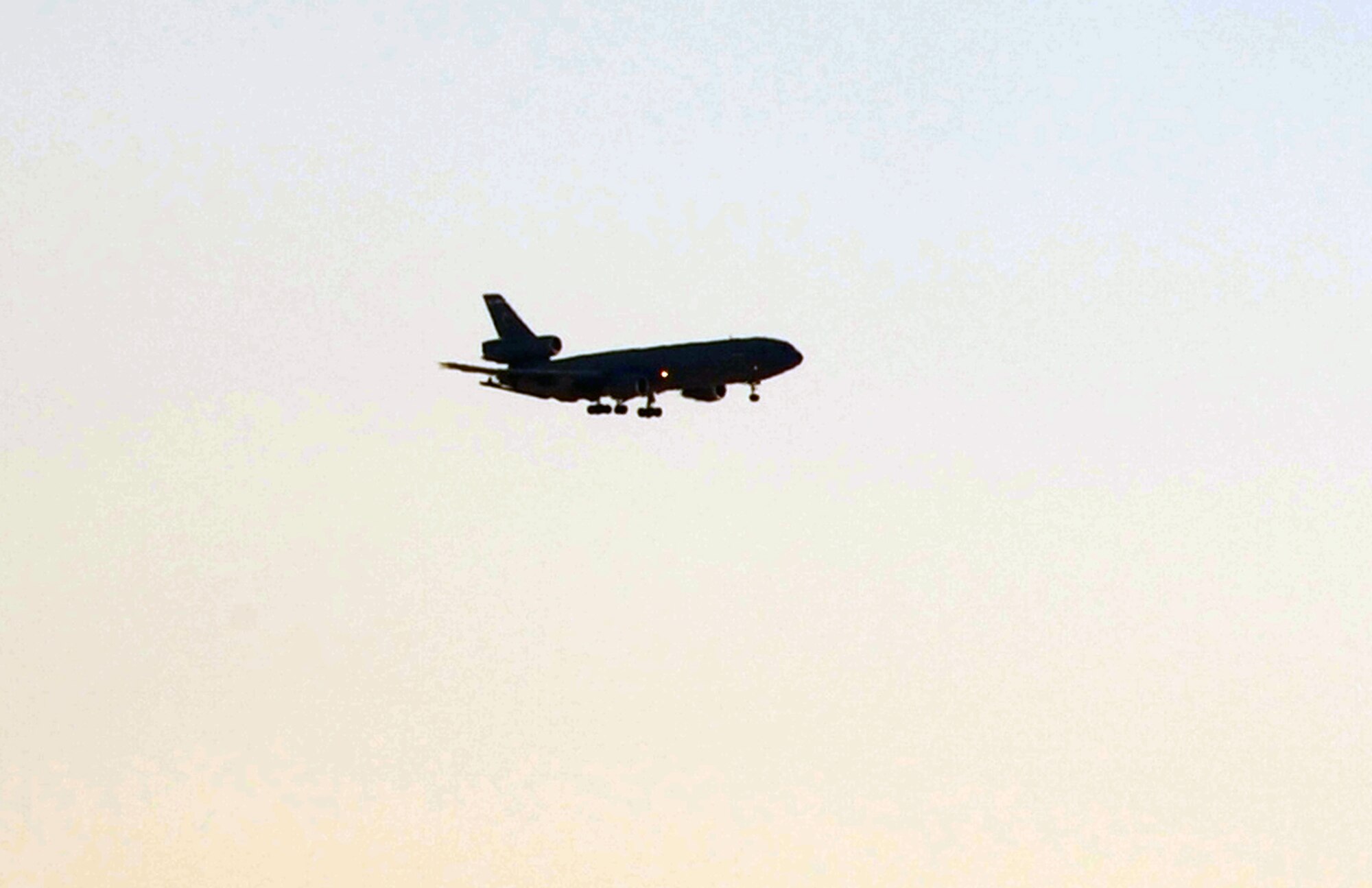 A KC-10 Extender comes in for a landing at a non-disclosed base in Southwest Asia on Jan. 6, 2010. The KC-10 is one of Air Mobility Command's air refueling aircraft deployed to the U.S. Central Command area of responsibility that provides the "global reach" for Air Force and Department of Defense aircraft through air refueling operations for Operations Iraqi Freedom and Enduring Freedom and the Combined Joint Task Force-Horn of Africa.  This KC-10 is assigned to the 908th Expeditionary Air Refueling Squadron of the 380th Air Expeditionary Wing.  (U.S. Air Force Photo/Tech. Sgt. Scott T. Sturkol/Released)