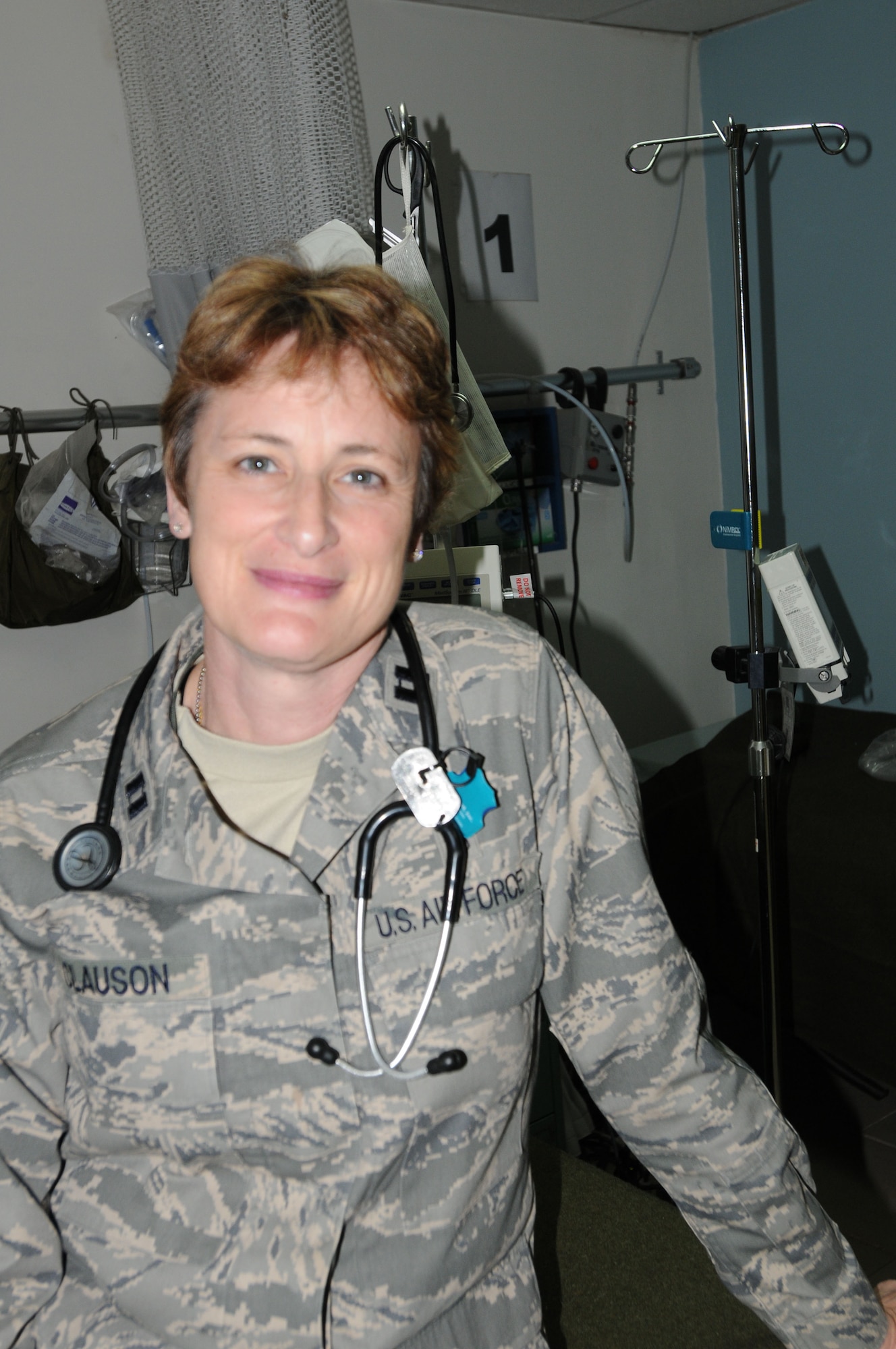 KIRKUK REGIONAL AIR BASE, IRAQ - Capt. Dawn Clauson, 506th Expeditionary Medical Squadron, takes a break between patients during a 24-hour shift January 11, 2010. (U.S. Air Force photo/Master Sgt. Martie Moore)