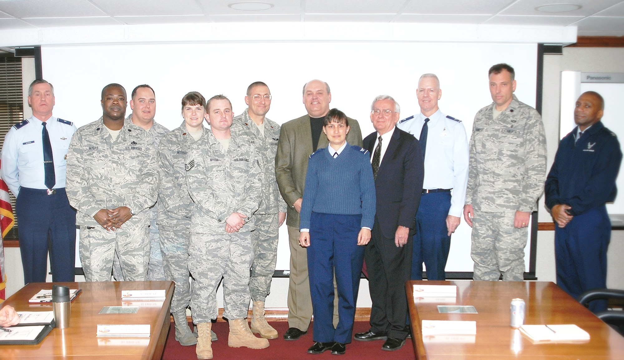 Sheppard senior leaders were recognized by Mike Slye, (center in black shirt) the city manager of Burkburnett, Texas, and Carl Law (center in black suit), the mayor of Burkburnett, Jan. 12 in the 82nd Training Wing Conference room, for their help rescuing scores of motorists stranded along Interstate 44 and Highway 287 during a blizzard Dec. 24. Pictured from left to right are: Brig. Gen. O.G. Mannon, 82nd TRW commander, Lt. Col. Henry Myers, commander of the 373rd Training Squadron; Master Sgt. Chase Smith, 882nd Training Support Squadron; Maj. Amy Woosley, the 882nd's medical readiness flight commander; Staff Sgt. Adam Myers of the 882nd TRSS; Maj. Jon Sinclair, 882nd TRSS; Mr. Slye, Col. Kimberley Ramos, 82nd Mission Support Group commander; Mayor Law, Col. Timothy Bray, 82nd Medical Group commander; Lt. Col. Kevin Franke, 882nd Training Support Squadron commander and Col. Tony Pounds, 782nd Training Group commander. (U.S. Air Force photo/Lou Anne Sledge)