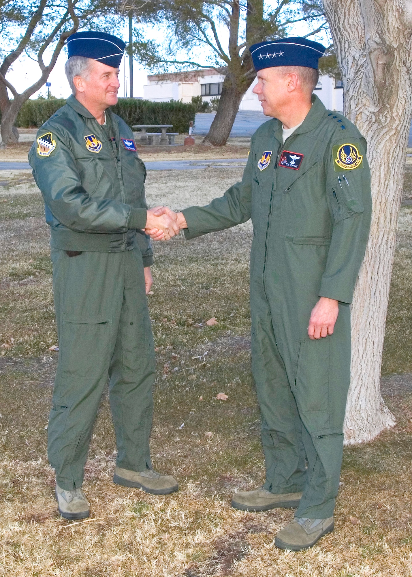 Maj. Gen. David Eichhorn, Air Force Flight Test Center commander, greets Gen. Donald Hoffman, commander Air Force Materiel Command. During his visit, General Hoffman will see some of Edwards numerous test programs. (U.S. Air Force photo/Heather Anhalt)