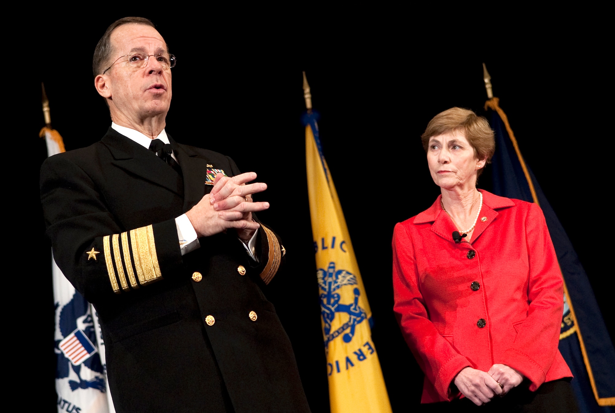 Adm. Mike Mullen, chairman of the Joint Chiefs of Staff, and his wife, Deborah, address the audience Jan. 13, 2010, at the 2nd Annual Suicide Prevention Conference sponsored by the Defense and Veterans Affairs departments in Washington, D.C. (Defense Department photo/Petty Officer 1st Class Chad J. McNeeley)