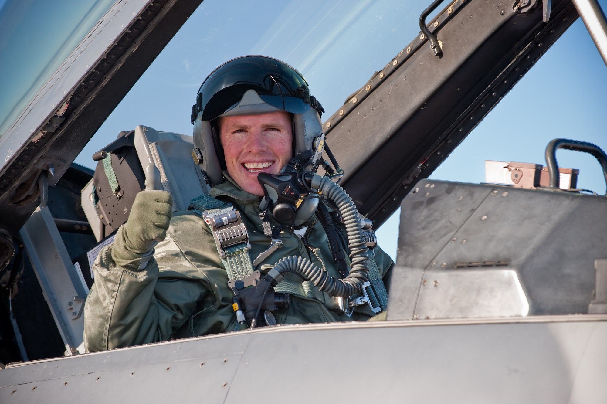 Pro Rodeo Cowboy Association rider Josh 'Jack Daniels' Peek gives the 'thumbs-up' that he is buckled in and ready just prior to his F-16 orientation flight at Buckley Air Force Base,  Jan 8, 2010. (U.S. Air Force photo/Master Sgt. John Nimmo, Sr.) (RELEASED)

