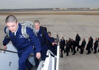 Recent Air Force Basic Military Training graduates board a plane bound for Keesler Air Force Base, Miss., Jan. 11. The Airmen will be attending one of Keesler's 39 technical schools. (U.S. Air Force photo/Alan Boedeker) 