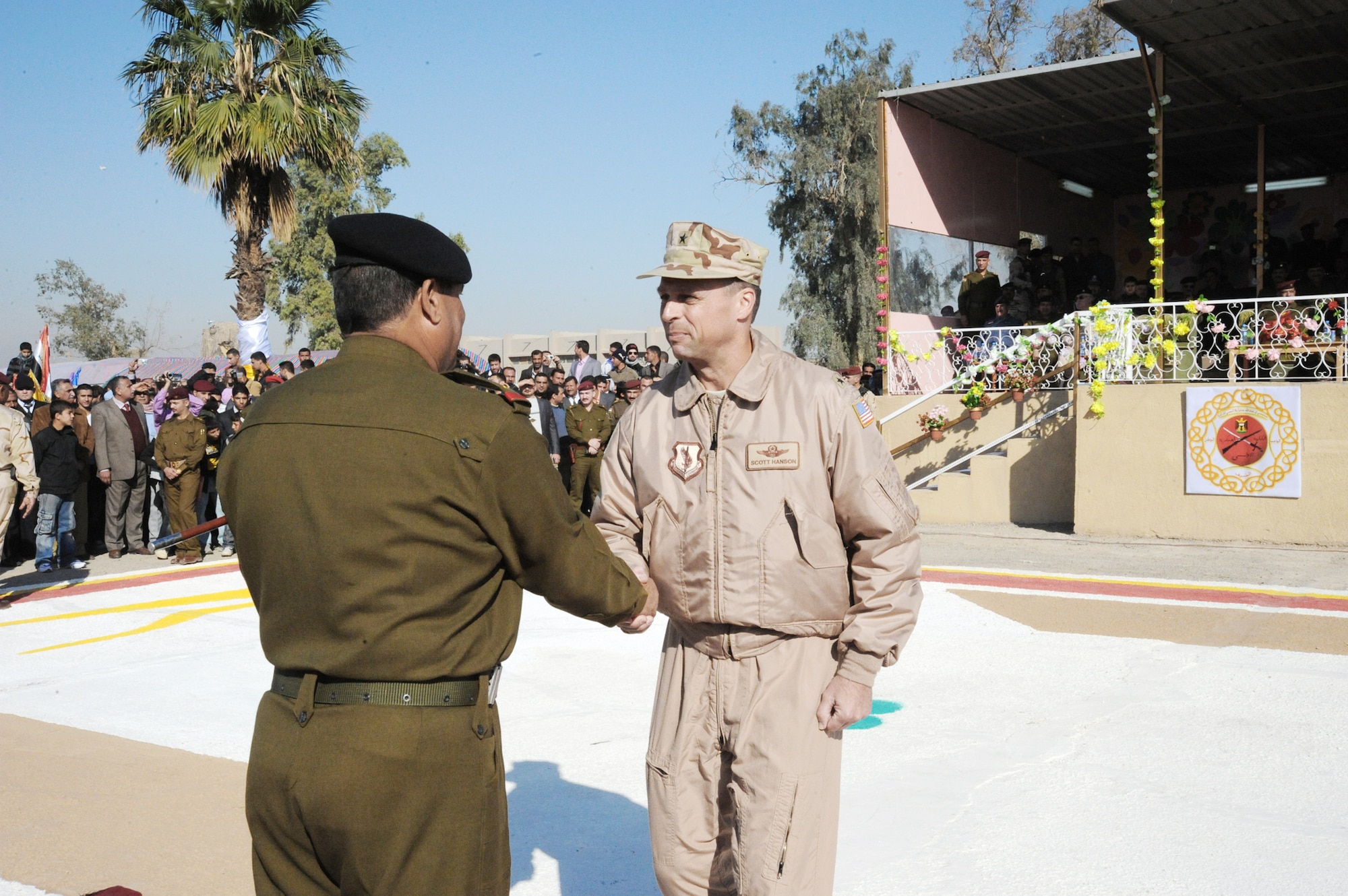 Iraqi staff Gen. Aboud Ganbar salutes cadets during a pass in review at an Iraqi air force officer graduation ceremony Jan. 10, 2010, at the Iraqi Military Academy-Rustamiyah, Iraq. General Ganbar is the deputy of the Iraqi army chief of staff for operations. (U.S. Air Force photo/Master Sgt. Trish Bunting)