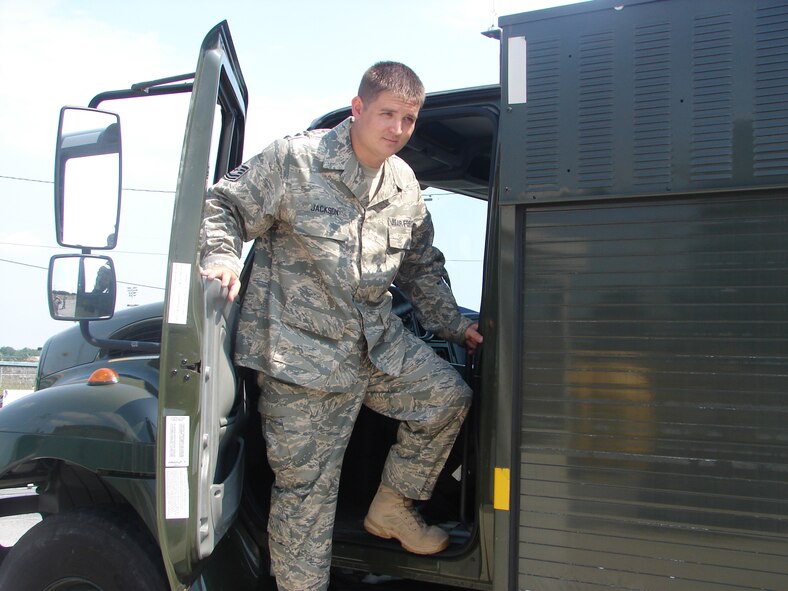 Tech. Sgt. David Jackson, 512th Logistics Readiness Flight, steps out of an R-11 refueling truck during a checkpoint operation. Refueling vehicles are inspected daily to ensure operational capability and safety requirements are maintained. Sergeant Jackson is the 22nd Air Force Air Reserve Component Fuels NCO of the Year. He, along with five co-workers, will now compete at the Air Force Reserve Command level. Twenty-second Air Force also named the 512th LRF as the recipient of the Daedalian Maj. Gen. Warren R. Carter Logistics Readiness Award. (U.S. Air Force photo)

 