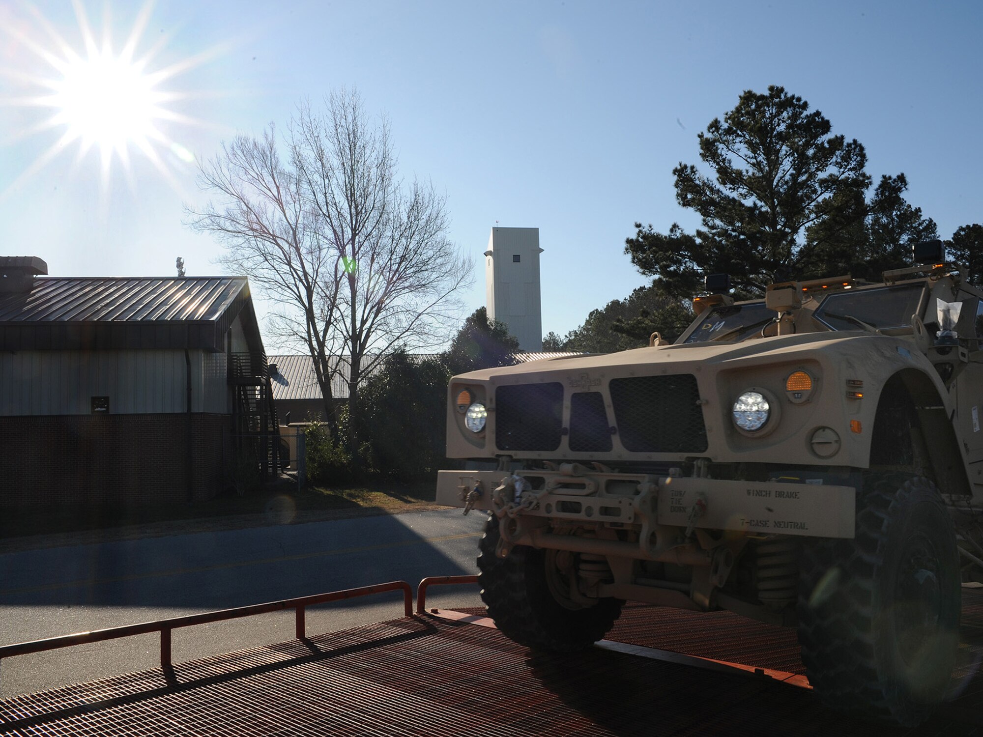 A mine-resistant, ambush-protected all-terrain vehicle is driven onto a Tunner 60K Loader to be prepared for shipment here Jan. 5. The M-ATVs are designed as an improvement on the High Mobility Multipuprose Wheeled Vehicle, or HMMWV. (U.S. Air Force photo/Senior Airman Katie Gieratz)(RELEASED)
