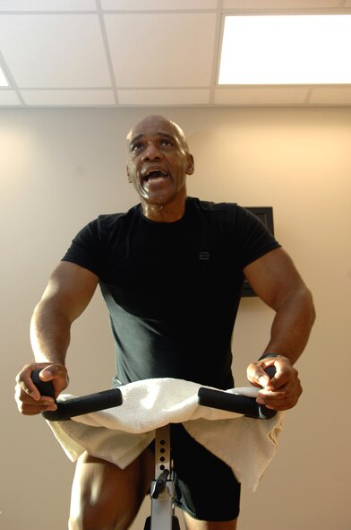 MINOT AIR FORCE BASE, N.D. -- Paul Stubbs, 5th Force Support Squadron fitness center director, motivates his spin class during the Aerobathon at the McAdoo Sports and Fitness Center here Jan. 9. The 5th FSS created the Aerobathon to introduce a variety of aerobic classes offered to base personnel. (U.S. Air Force photo by Senior Airman Michael J. Veloz)