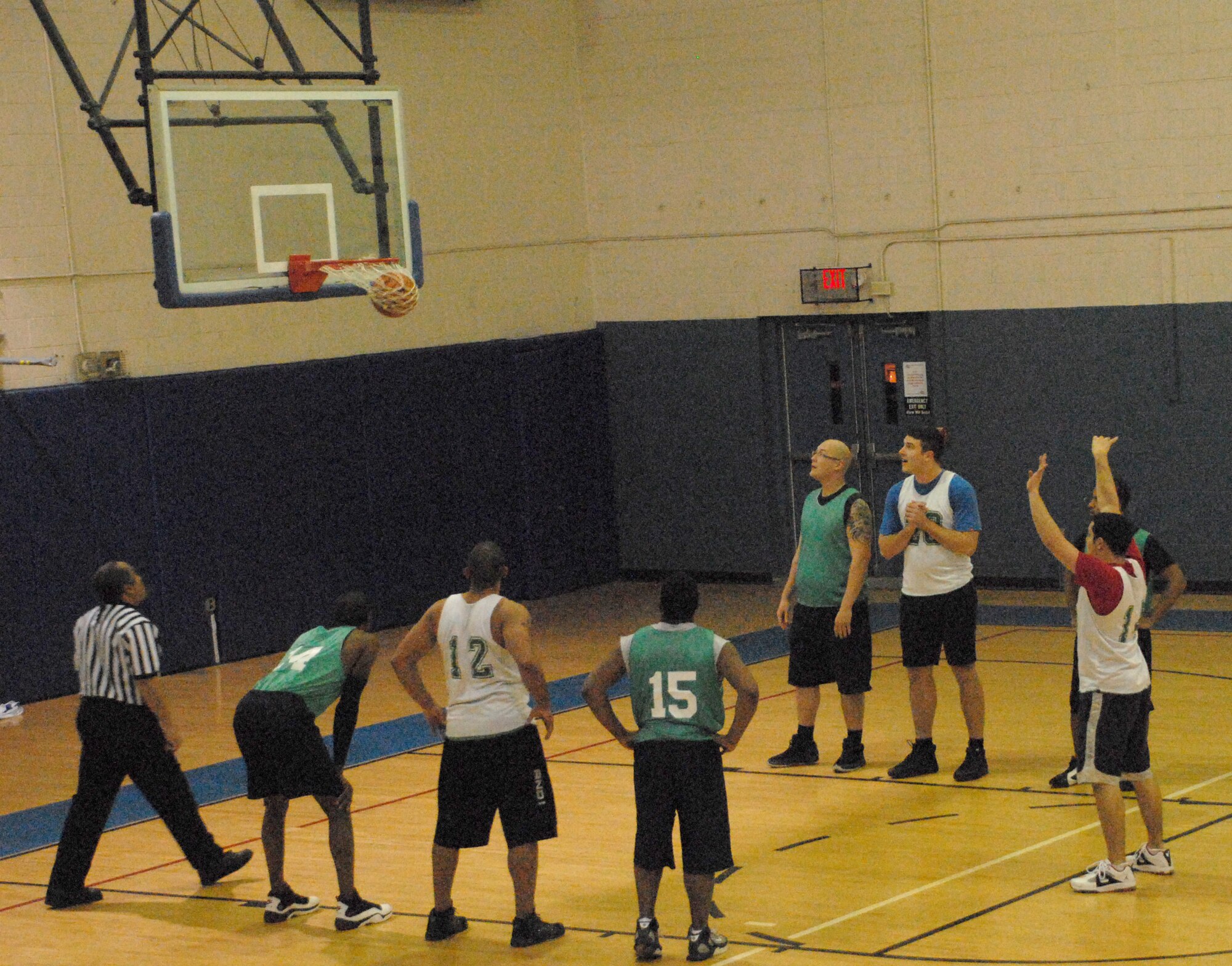 Gary Stines, 436th Communication Squadron intramural basketball team guard, shoots a free throw Jan. 6. The final score was 31-11, with 436th CS defeating 436th Aircraft Maintenance Squadron. (U.S. Air Force photo/Airman 1st Class Matthew Hubby)