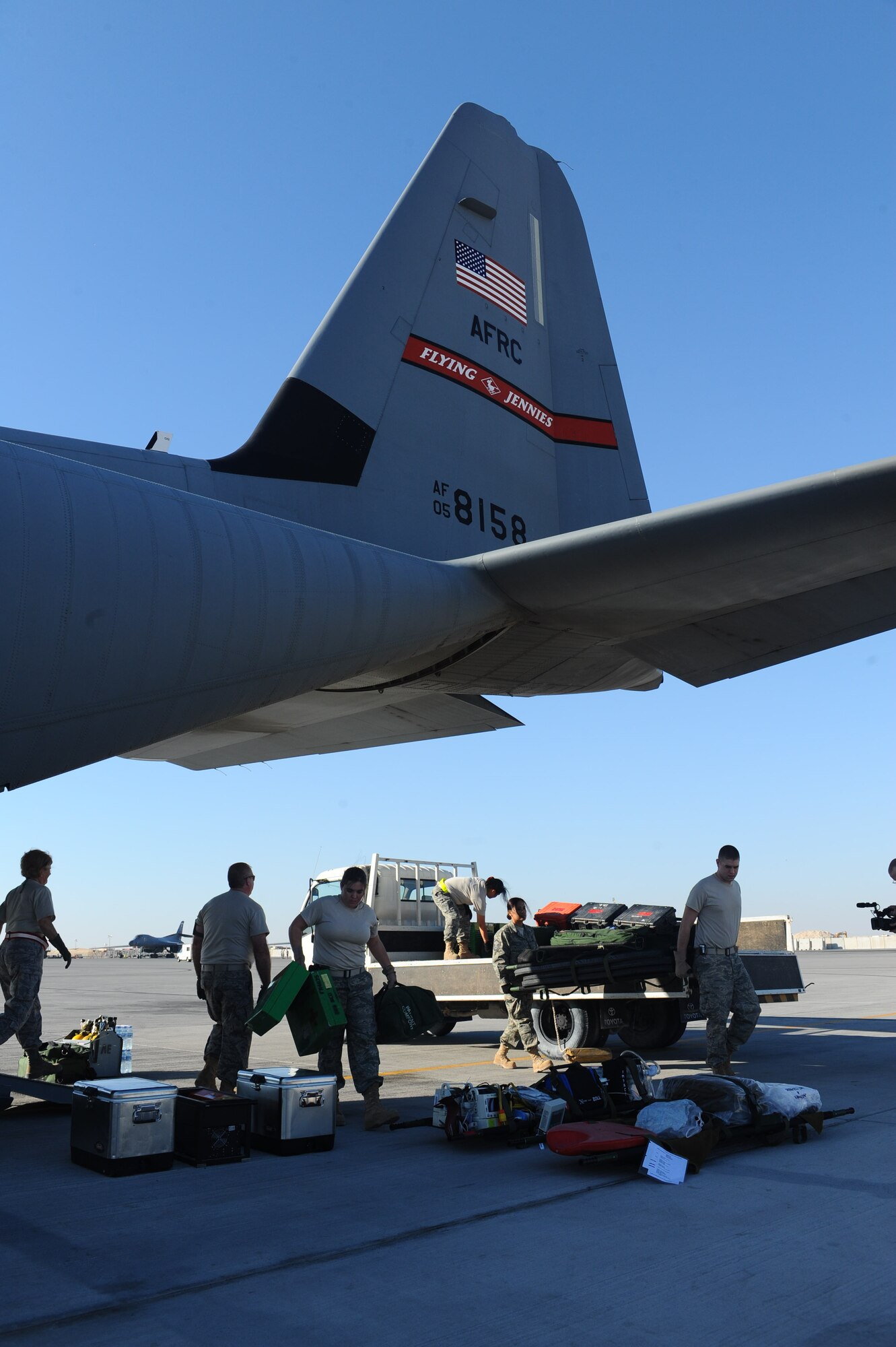 100109-F-3622Z-032
Airmen from the 379th Expeditionary Airlift Evacuation Squadron load a C-130 Hercules for a medical evacuation mission at a non-disclosed Southwest Asia location Jan. 9, 2010.  The C-130 can be rapidly reconfigured for the various types of cargo such as palletized equipment, floor-loaded material, airdrop platforms, container delivery system bundles, vehicles and personnel or aeromedical evacuation. (U.S. Air Force photo by Senior Airman Kasey Zickmund)[RELEASED]