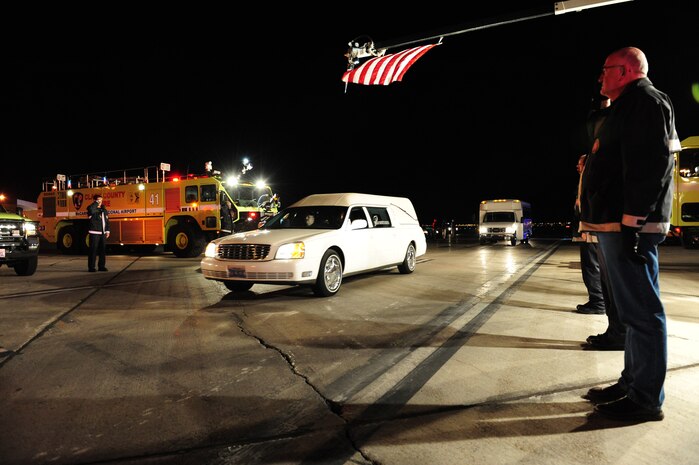 LAS VEGAS-- The Clark County Fire Department pays respects to Maj. Russell C. Goodman as his hearse leaves McCarran International Airport Jan. 12.  Major Goodman served as the narrator for the U.S. Air Force Air Demonstration Squadon "Thunderbirds" from 1964-65 and was declared missing in action after his aircraft was hit by a surface-to-air missile Feb. 20, 1967, while on a combat mission over North Vietnam. At the time of his loss, Major Goodman was still assigned to the Thunderbirds and was flying with the U.S. Navy on an exchange program. Funeral services for Major Goodman will take place at the Thunderbirds Hangar at Nellis AFB Jan. 14. He is to be buried in Alaska at a date determined by his family. (U.S. Air Force Photo by Staff Sgt. William P. Coleman/RELEASED)

