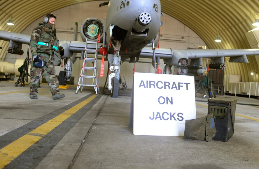Staff Sgt. Randal Ogozalek checks the jacks on an A-10 aircraft in a
25th Fighter Squadron hanger during Operational Readiness Exercise Beverly
Bulldog 10-01 at Osan Air Base, Republic of Korea, Jan. 13.  Sergeant
Ogozalek is a crew chief from the 51st Aircraft Maintenance Squadron. (U.S.
Air Force photo/Senior Airman Stephenie Wade)
