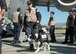 PORT-AU-PRINCE, Haiti -- Ron Wickbacher, canine search specialist from California Task Force 2, along with canine companion Dawson, a live-scent dog trained for humanitarian search and rescue, prepare for their mission in Haiti. (U.S. Air Force photo/2nd Lt. Holly Hess)