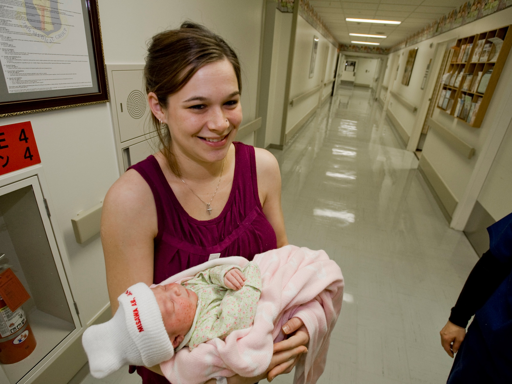 MISAWA AIR BASE, Japan -- Alisha Volner holds her daughter, Alexis Rose Volner, Jan. 13 at the 35th Medical Group. Alexis was born 11:16 p.m. Jan. 11 and was the first baby born on Misawa Air Base in 2010. (U.S. Air Force photo/Senior Airman Jamal D. Sutter)