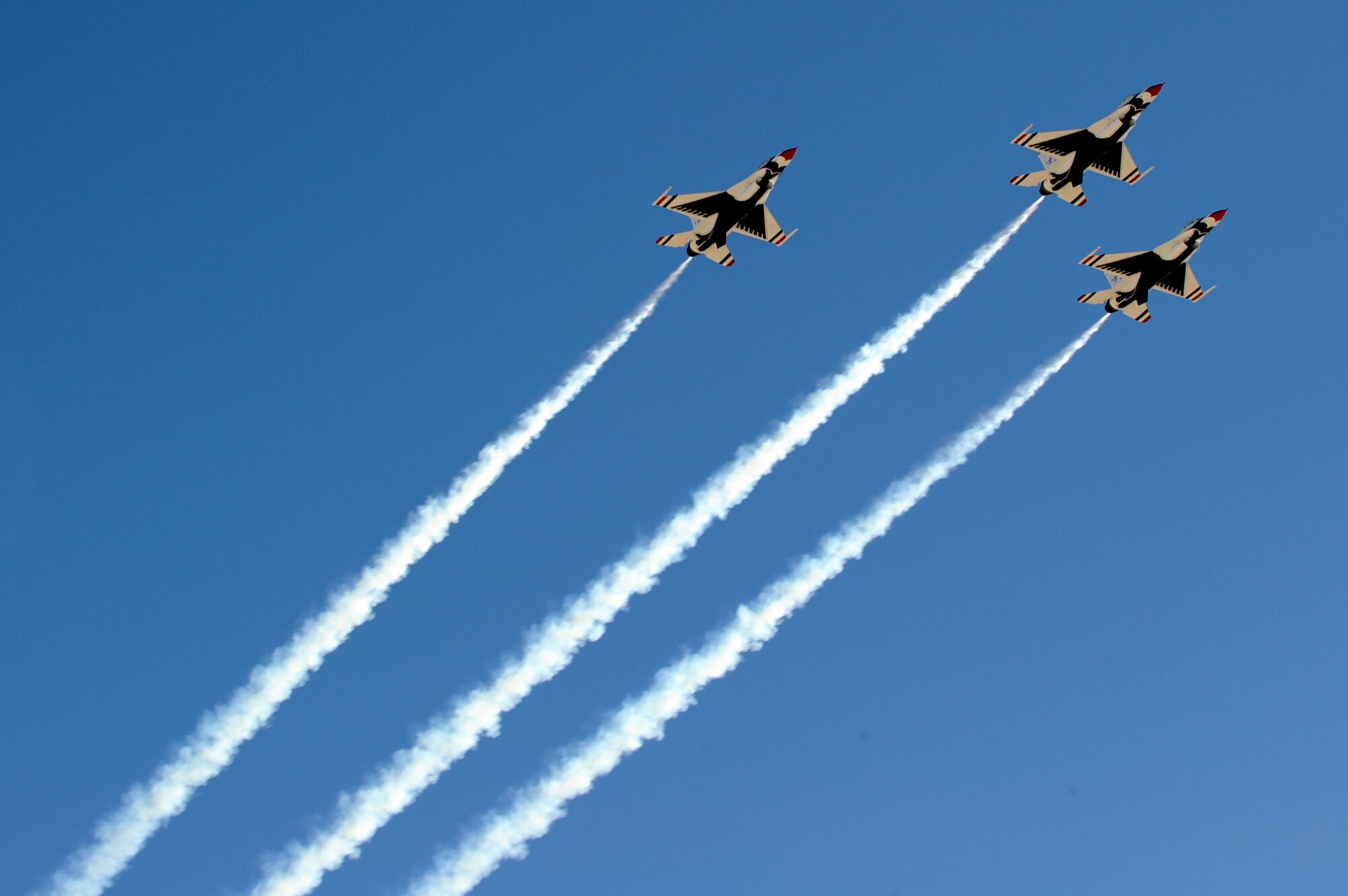 NELLIS AIR FORCE BASE, Nev.-- The U.S. Air Force Thunderbirds perform the missing man formation during the repatriation and funeral service for Major Russell C. Goodman.  Maj. Goodman served as the narrator for the U.S. Air Force Thunderbirds from 1964-65 and was declared Missing-In-Action after his aircraft was hit by a surface-to-air missile in Feb. 1967, while on a combat mission over North Vietnam.
(U.S. Air Force photo by Lawrence Crespo)