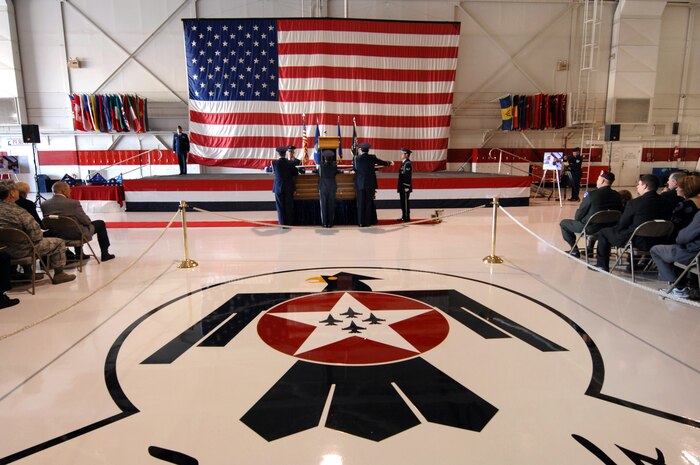 NELLIS AIR FORCE BASE, Nev.-- The Nellis Honor Guard prepare to fold the American flag during the repatriation and funeral service for Major Russell C. Goodman Jan. 14.  Maj. Goodman served as the narrator for the U.S. Air Force "Thunderbirds" from 1964-65 and was declared Missing-In-Action after his aircraft was hit by a surface-to-air missile in Feb. 1967, while on a combat mission over North Vietnam.(U.S. Air Force photo by Lawrence Crespo)