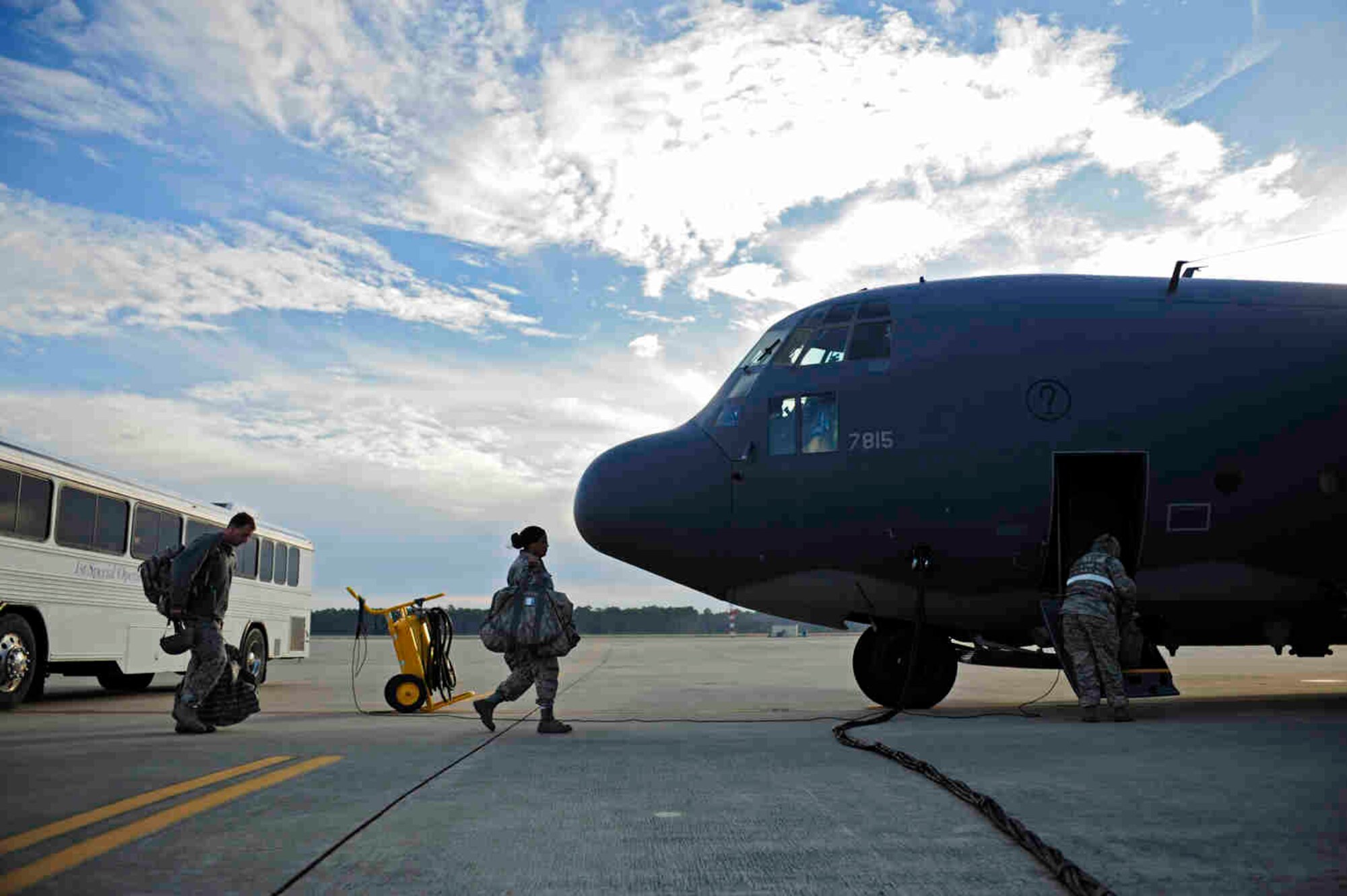 U.S. Air Force personnel load onto a C-130 Hercules at Hurlburt Field, Fla. Jan. 14, 2010, for transport to Haiti in support of humanitarian operations.  The U.S. Air Force is providing humanitarian assistance and disaster relief to Haiti after a magnitude 7 earthquake hit the country Jan. 12, 2010.  U.S. Air Force photo by Tech. Sgt. James L. Harper Jr.

