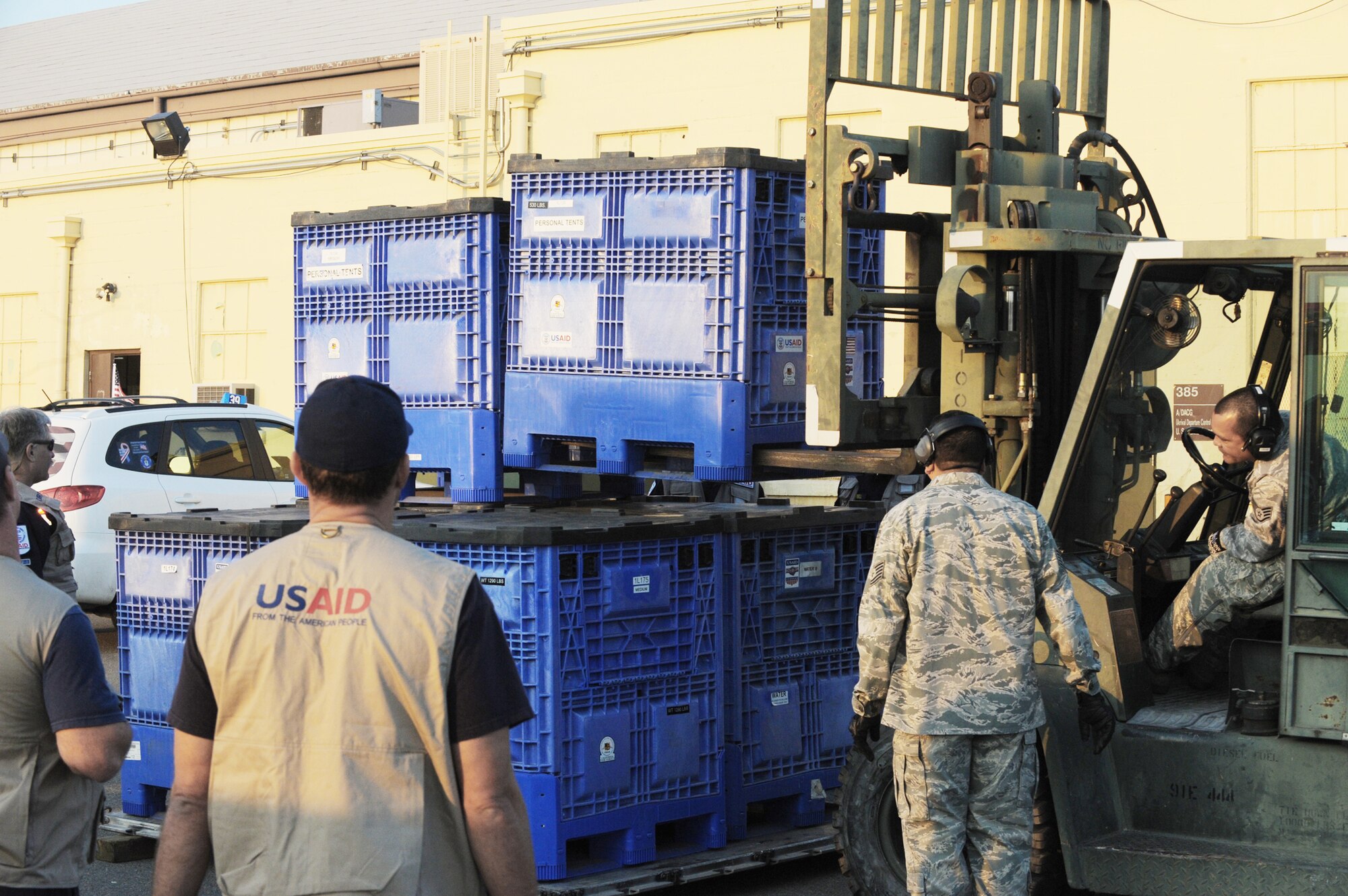 Relief workers and search and rescue teams use March Air Reserve Base, Calif., as a staging area to assemble supplies, people and equipment Jan. 13, 2010, following the recent 7.0-magnitude earthquake in Haiti. All will be loaded on a C-17 Globemaster III and flown into Port-au-Prince, Haiti. The aircraft is assigned to the 60th Air Wing at Travis Air Force Base, Calif., (U.S. Air Force photo/Master Sgt. Roy Santana)