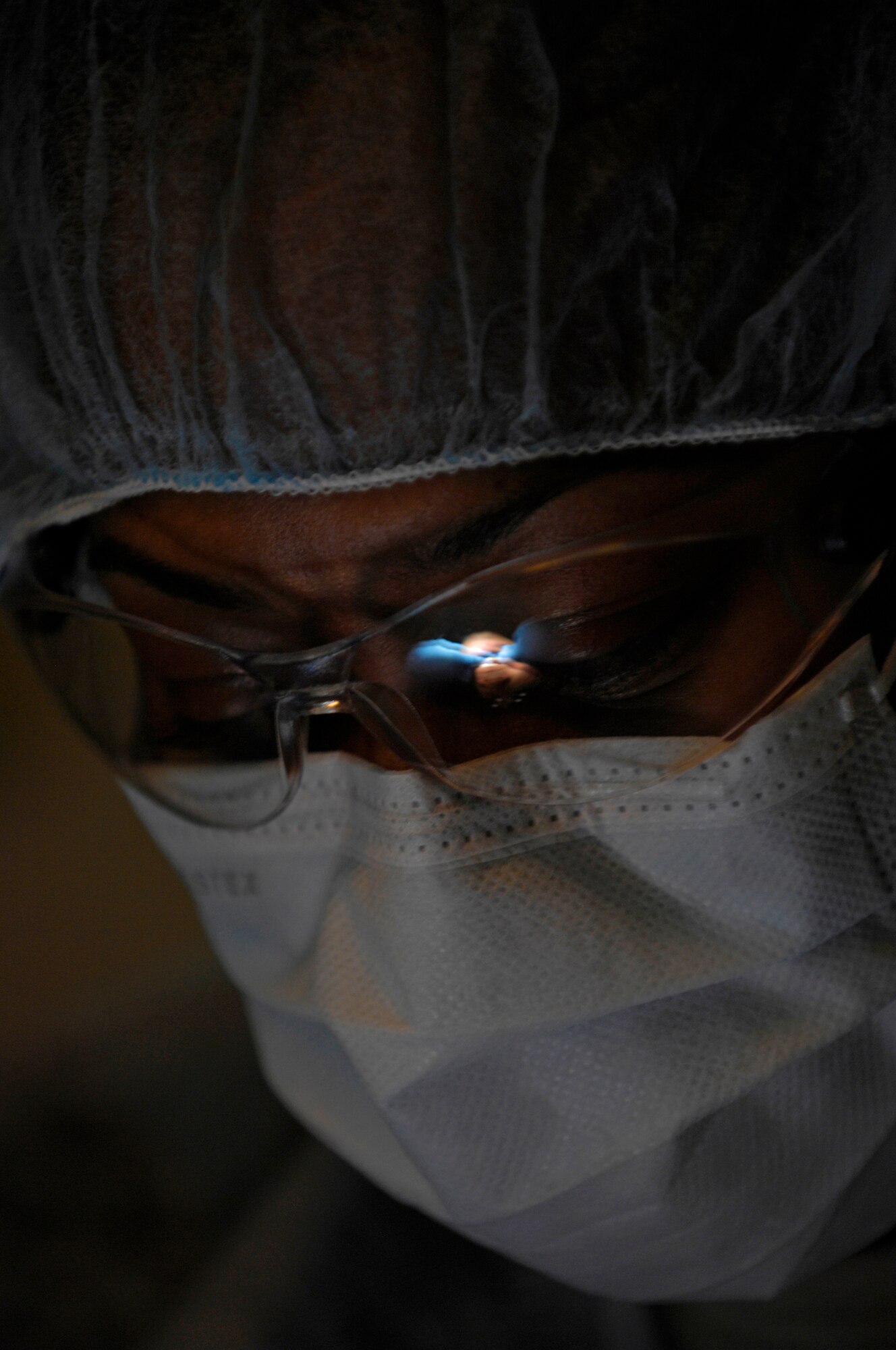 VANDENBERG AIR FORCE BASE, Calif. --  Staying calm and focused, Staff Sgt. Asia Nettles, a dental assistant craftsman from the 30th Medical Operations Squadron here, polishes the teeth of Capt. Chris Sakamoto, from the 533rd Training Squadron here, during an annual dental cleaning here Tuesday, Jan. 12, 2010.  (U.S. Air Force photo/Airman 1st Class Andrew Lee)