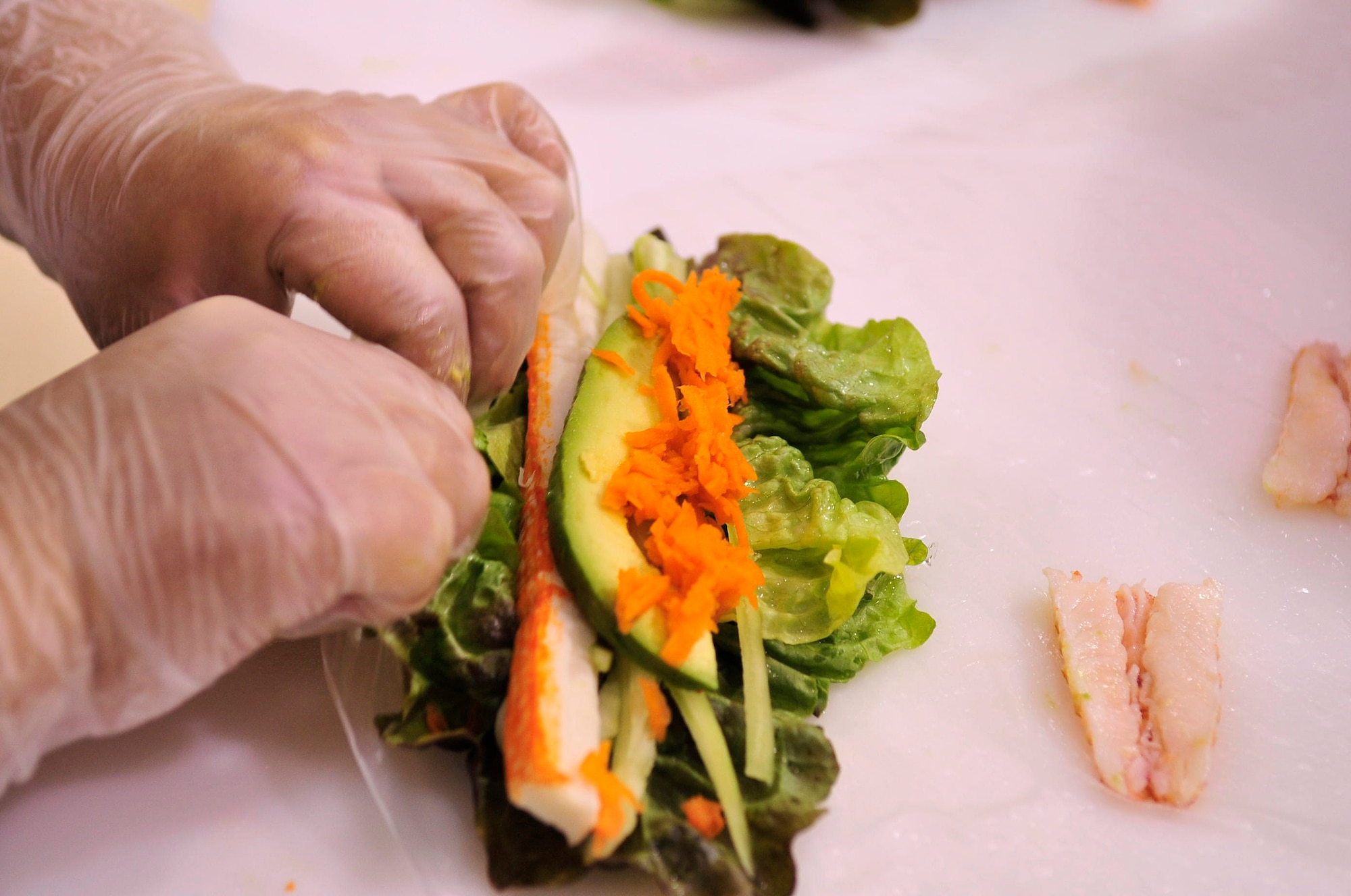 BUCKLEY AIR FORCE BASE, Colo. -- Naum Dim rolls sushi at the Buckley Commissary Jan. 13. Sushi is made fresh everyday. (U.S. Air Force photo by Airman 1st Class Manisha Vasquez)