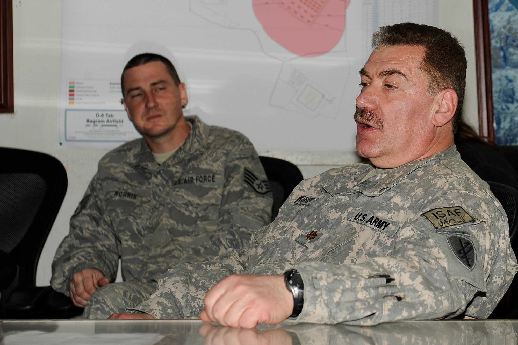 BAGRAM AIRFIELD, Afghanistan-- U.S. Army Maj. Vladimir Berkovich, 405th Civil Affairs, tells a joint service Afghan culture class on Bagram Airfield about his experiences serving in Afghanistan with the Soviet military Jan. 7, 2010. Berkovich is a Reservist out of Jackson, NJ.  (U.S. Air Force photo by: Tech. Sgt. Jeromy K. Cross)
