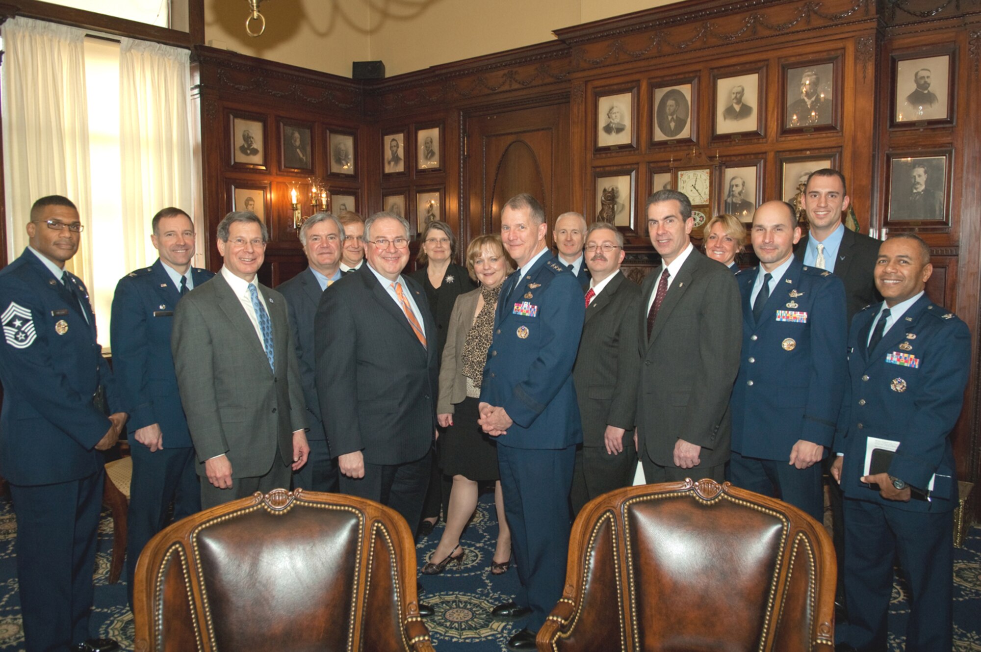 Speaker of the Massachusetts House Robert DeLeo and Electronic Systems Center Commander Lt. Gen Ted Bowlds (center), along with  members of ESC's senior staff, pause in the speaker's office Tuesday during a tour of the Massachusetts State House.  The tour was sponsored by State Representative Jay Kaufman (third from left) of Lexington. (U.S. Air Force by Rick Berry)
