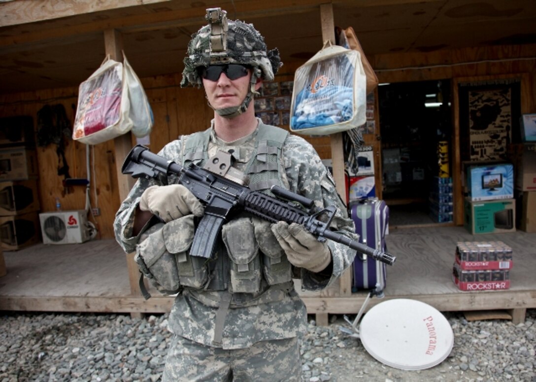 Army Spc. Robert Sumner, a native of Birmingham, England, and a British army veteran, now serves with the U.S. Army at Forward Operation Base Joyce in eastern Afghanistan’s Kunar province. U.S. Army photo by Sgt. Teddy Wade, 55th Signal Company 