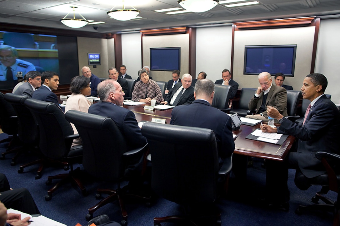 President Barack Obama meets in the Situation Room of the White House on the U.S. response to the earthquake in Haiti, Jan. 13, 2010. Defense Secretary Robert M. Gates and Navy Adm. Mike Mullen, chairman of the Joint Chiefs of Staff, attended the meeting.