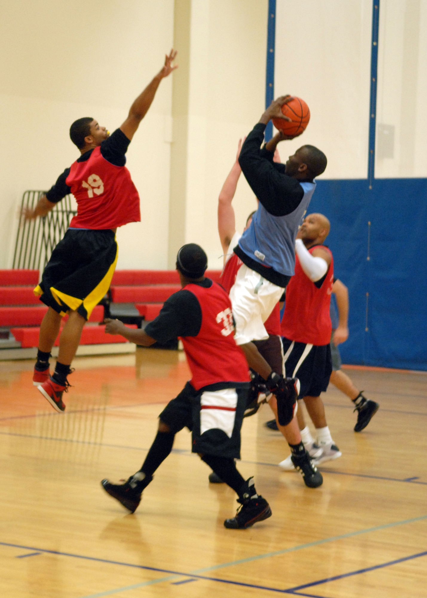 VANDENBERG AIR FORCE BASE, Calif. --Preventing a drive from inside the paint, Airman 1st Class DwayneChaun Leslie, of the 30th Logistical Readiness Squadron, defends the basket here Wednesday, Jan. 13, 2010. The second game of the Vandenberg intramural basketball season ended with a score of 50-34 with the 30th Launch Group as the victor. (U.S. Air Force photo/ Airman 1st Class Angelina Drake)

