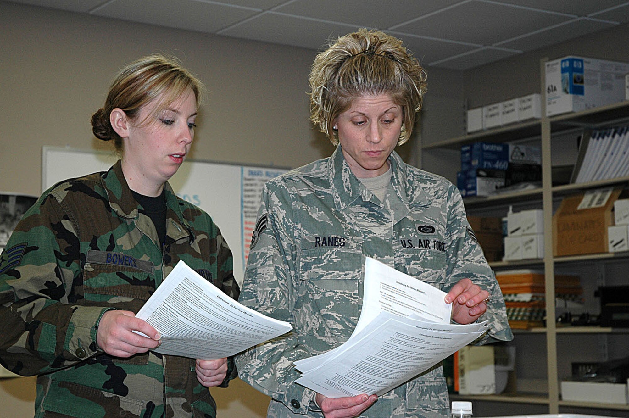 MCCHORD AIR FORCE BASE, Wash., - Staff Sgt. Janelle Bowers, left, and Senior Airman April Ranes, 446th Mission Support Squadron Military Personnel Flight here, review personnel records during the January 2010 UTA. (U.S. Air Force photo/Staff Sgt. Grant Saylor)