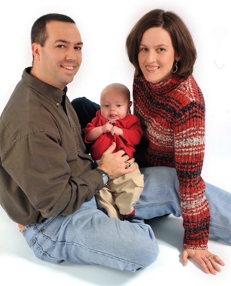 MOODY AIR FORCE BASE, Ga. -- Maj. Richard Waldrop, his wife, Kristen, and their son, Andrew, take a family portrait. (U.S. Air Force photo by Staff Sgt. Schelli Jones)