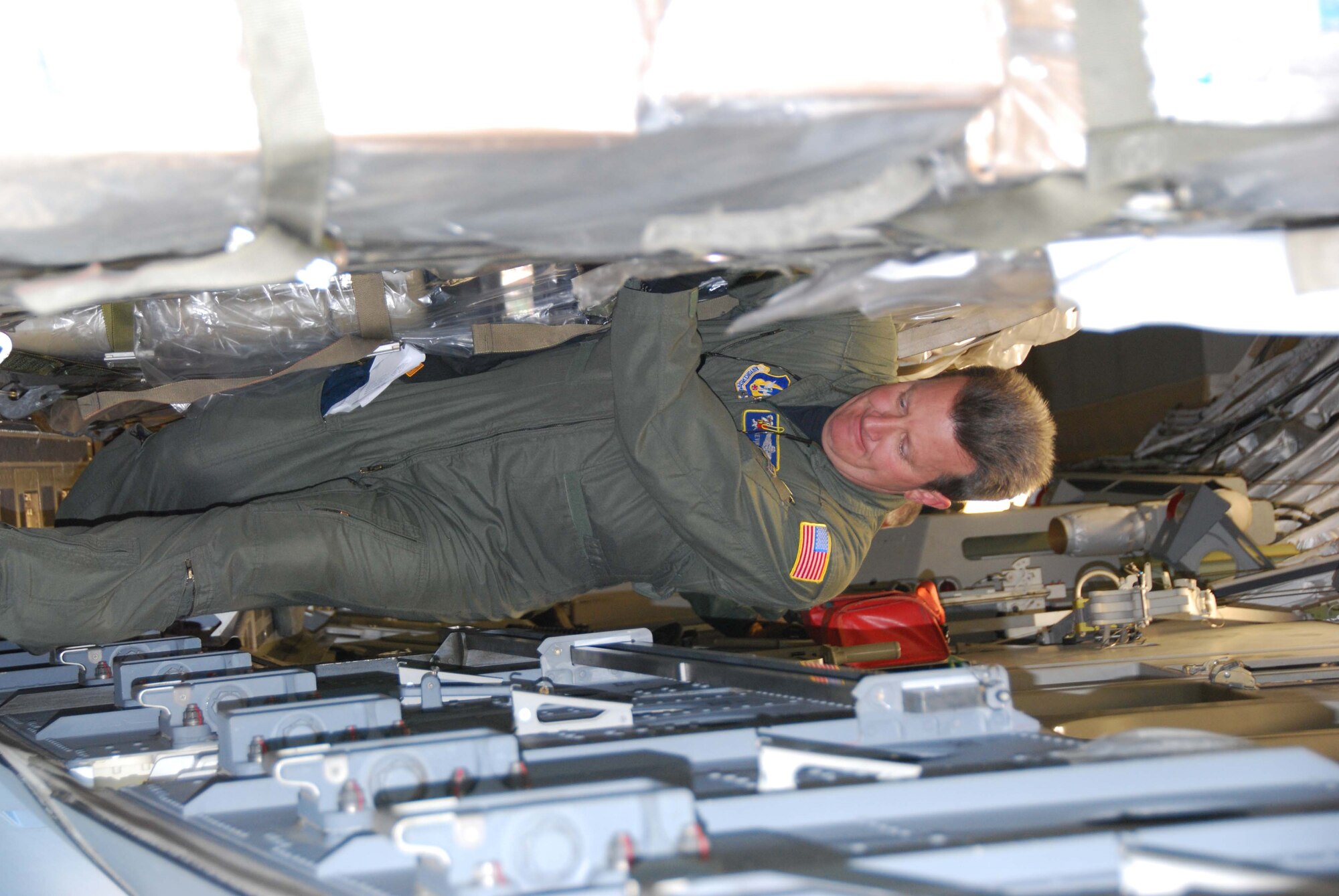 JOINT BASE MCGUIRE-DIX- LAKEHURST, N.J. - Master Sgt. Kevin Keane, a Reserve loadmaster, helps prepare a C-17 Globemaster III for departure to the Toussaint Louverture International Airport, Haiti, Jan. 14. He was one of ten Reserve aircrew members from the 732nd Airlift Squadron stationed here to transport equipment and more than 70 personnel to the earthquake stricken country. (U.S. Air Force photo/Master Sgt. Donna T. Jeffries)