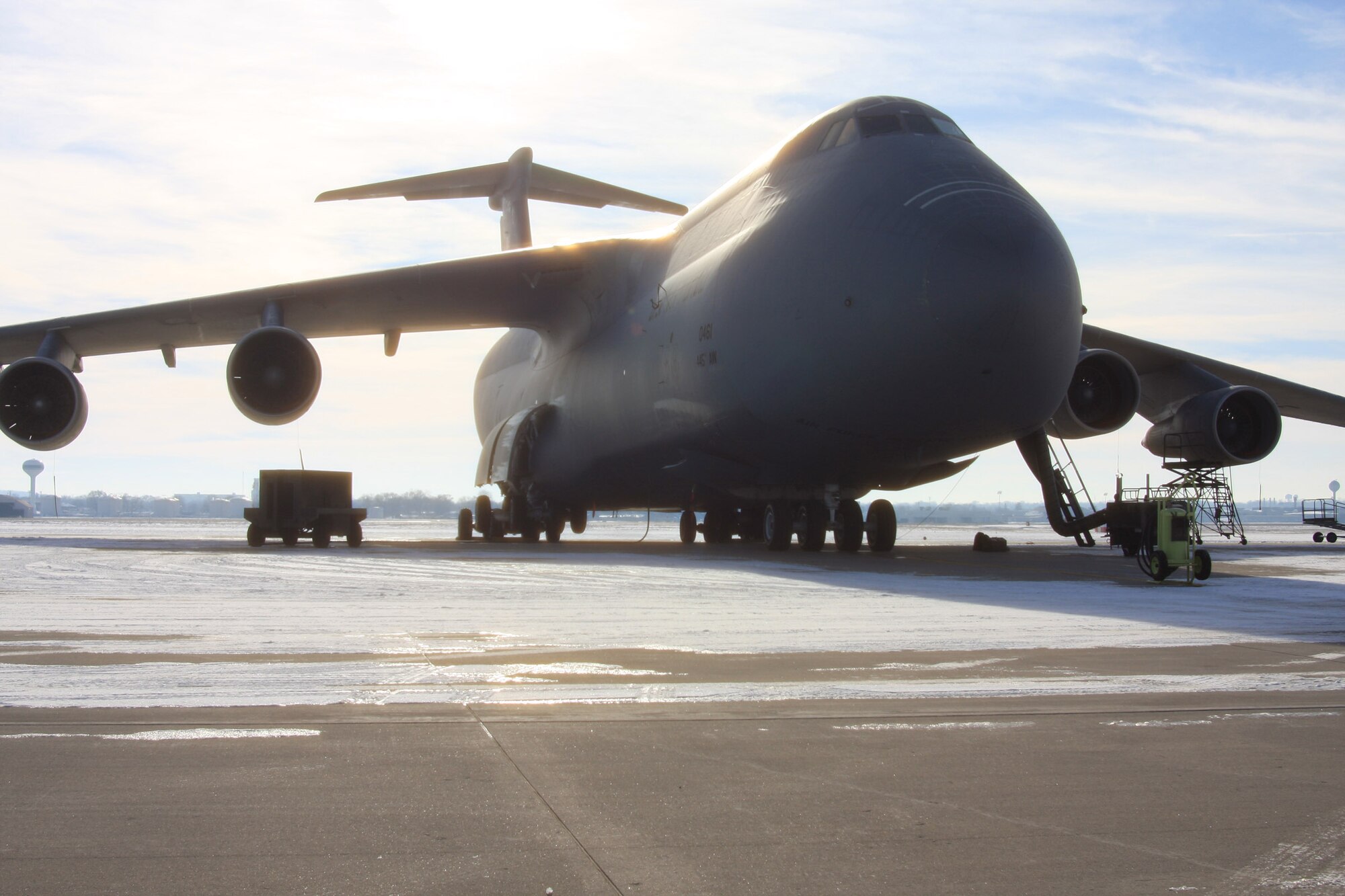 WRIGHT-PATTERSON AIR FORCE BASE, Ohio – Snow patches surround the C-5 Galaxy aircraft on the flightline at the 445th Airlift Wing Jan. 14 after a cold front moved into the area earlier this month, bringing in several inches of snow.  (U.S. Air Force photo/Senior Airman Mikhail Berlin)