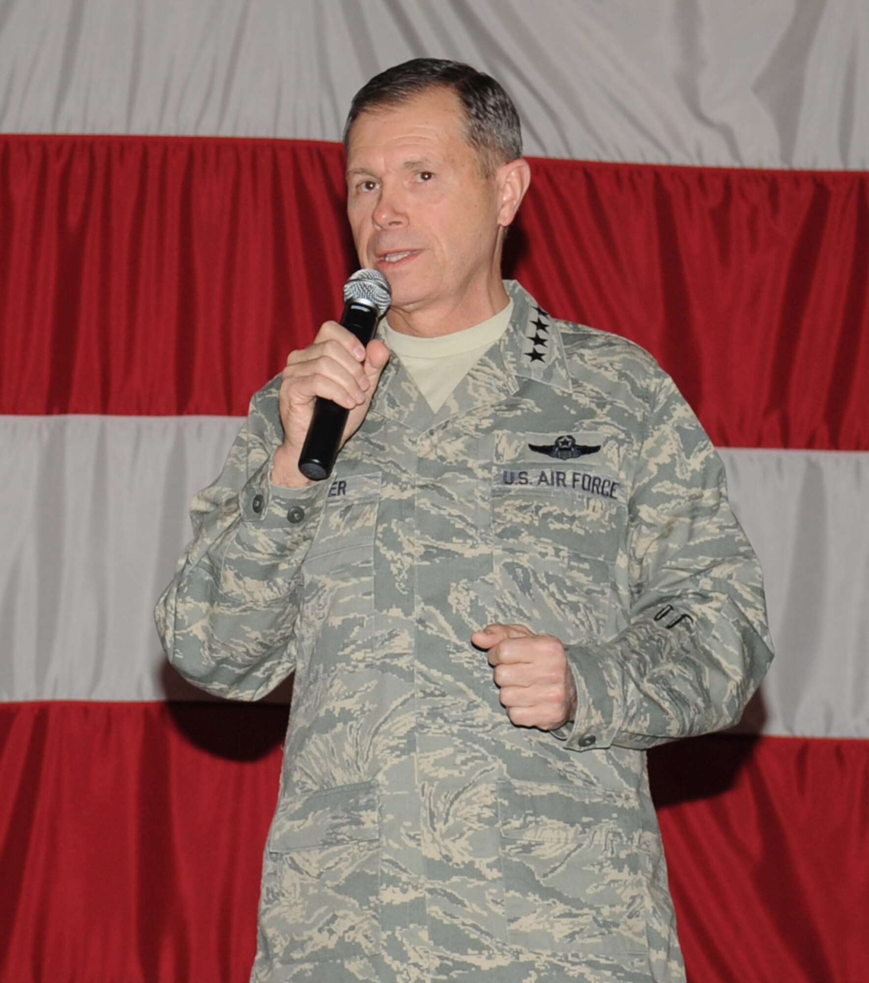 Barksdale AFB, La. - Gen. William Fraser, Air Combat Command commander, speaks to many Airmen during the All-Call Jan. 12. A few Airmen asked the general questions about the base and the turn-over to Air Force Global Strike Command. (U.S. Air Force photo by Senior Airman Alexandra M. Longfellow) (RELEASED)
