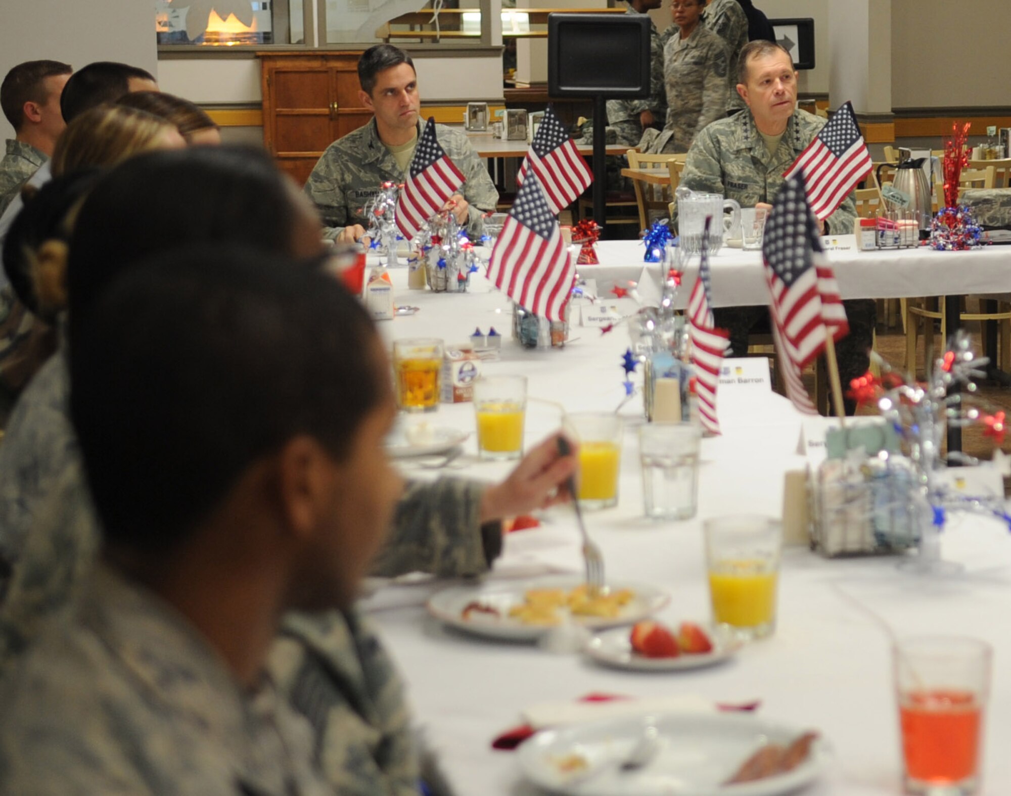 Barksdale AFB, La. - Gen. William Fraser. Air Combat Command commander, sat down with several Barksdale Airman during breakfast Jan. 12. General Fraser visited Barksdale to see the progress of the base before handing 2d Bomb Wing over to Air Force Global Strike Command in Feb. (U.S. Air Force photo by Senior Airman Alexandra M. Longfellow) (RELEASED)